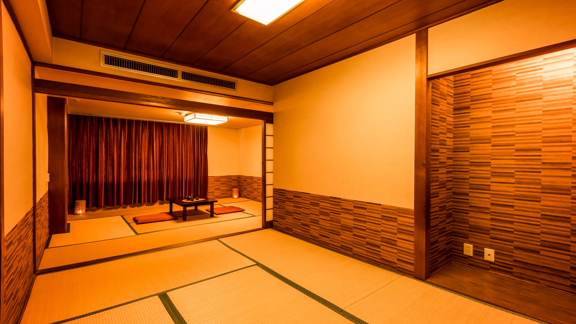 2 standard Japanese-style rooms of 12 to 14 tatami mats *Example of guest room