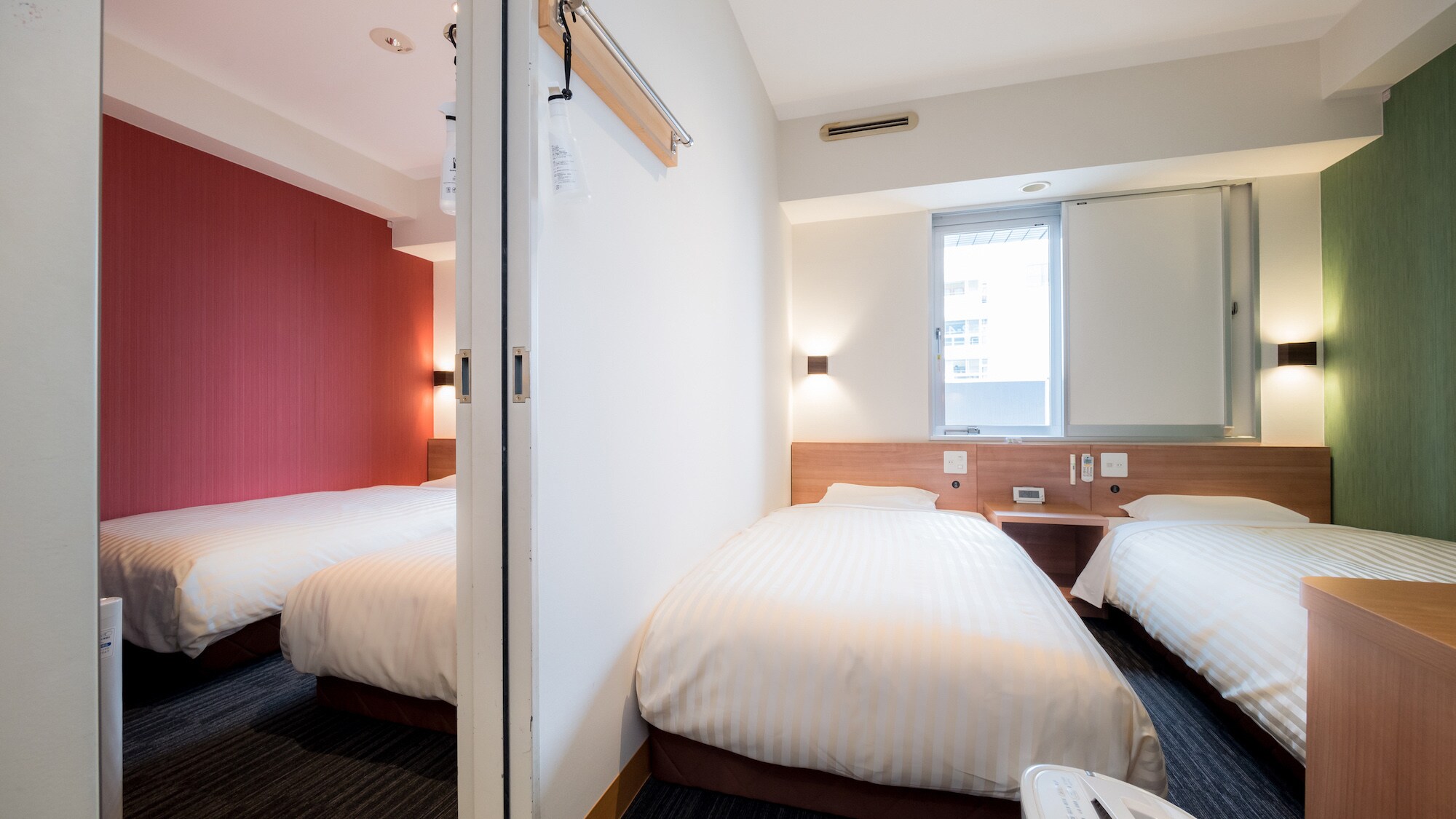 This room has two rooms with a door between them.