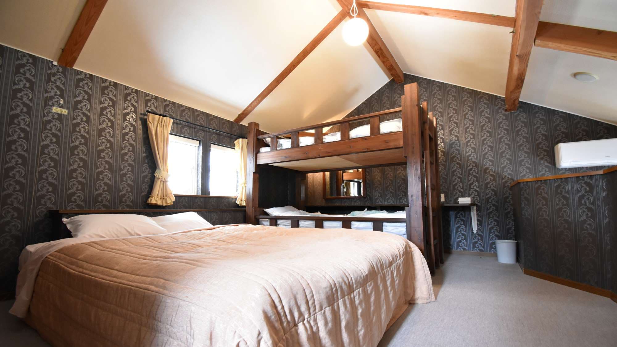 ・Family A: The bedroom has one double bed and one bunk bed.