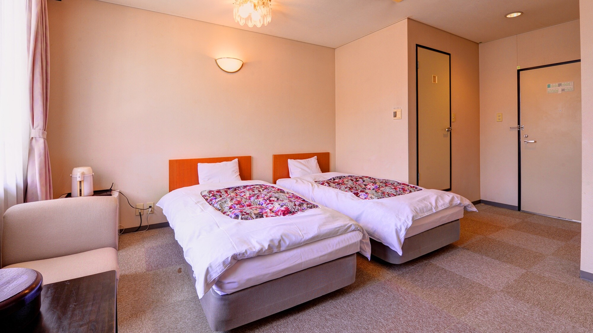 * Western-style twin room (example of guest room)