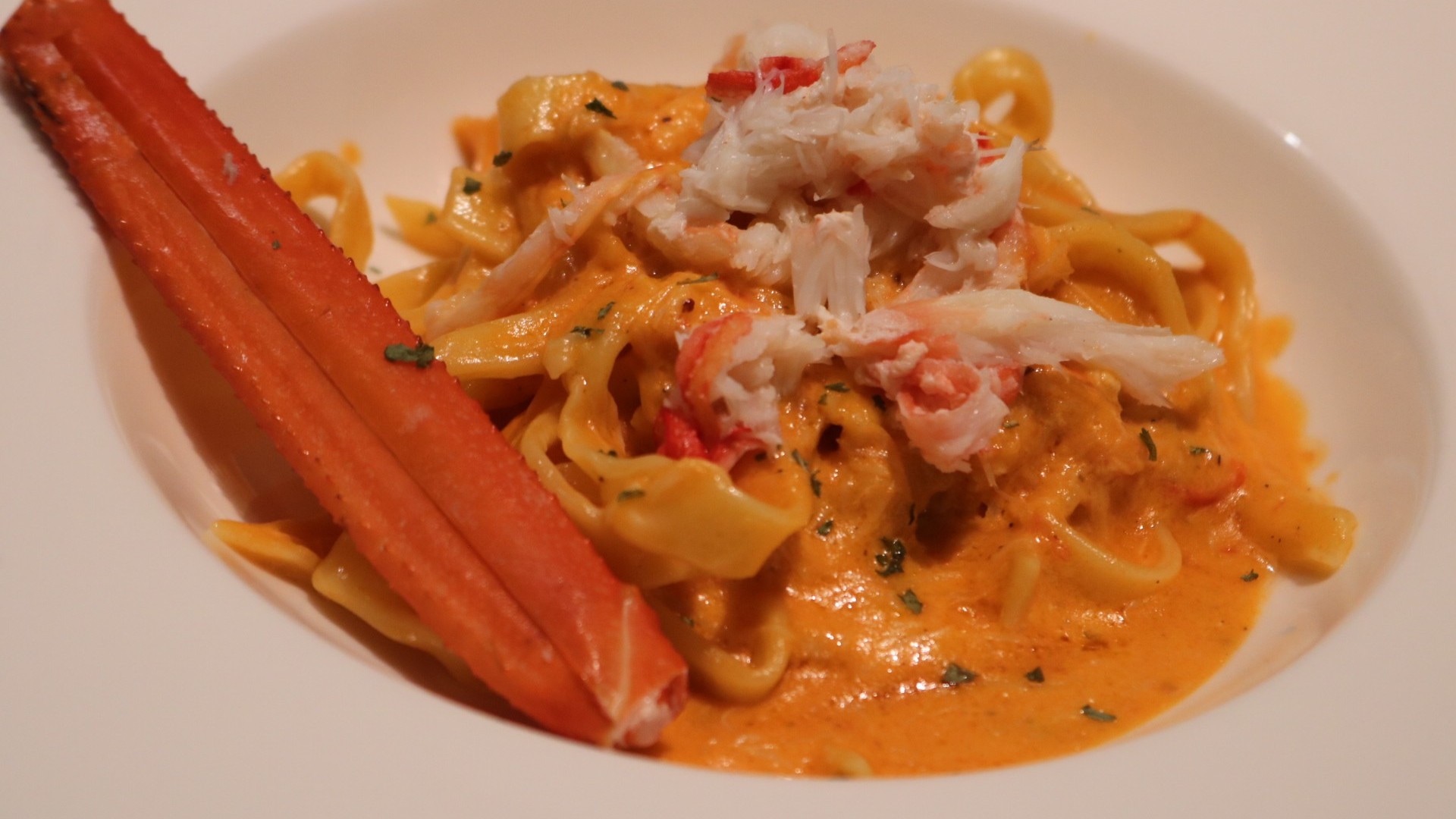 Homemade fresh pasta fettuccine with snow crab sauce