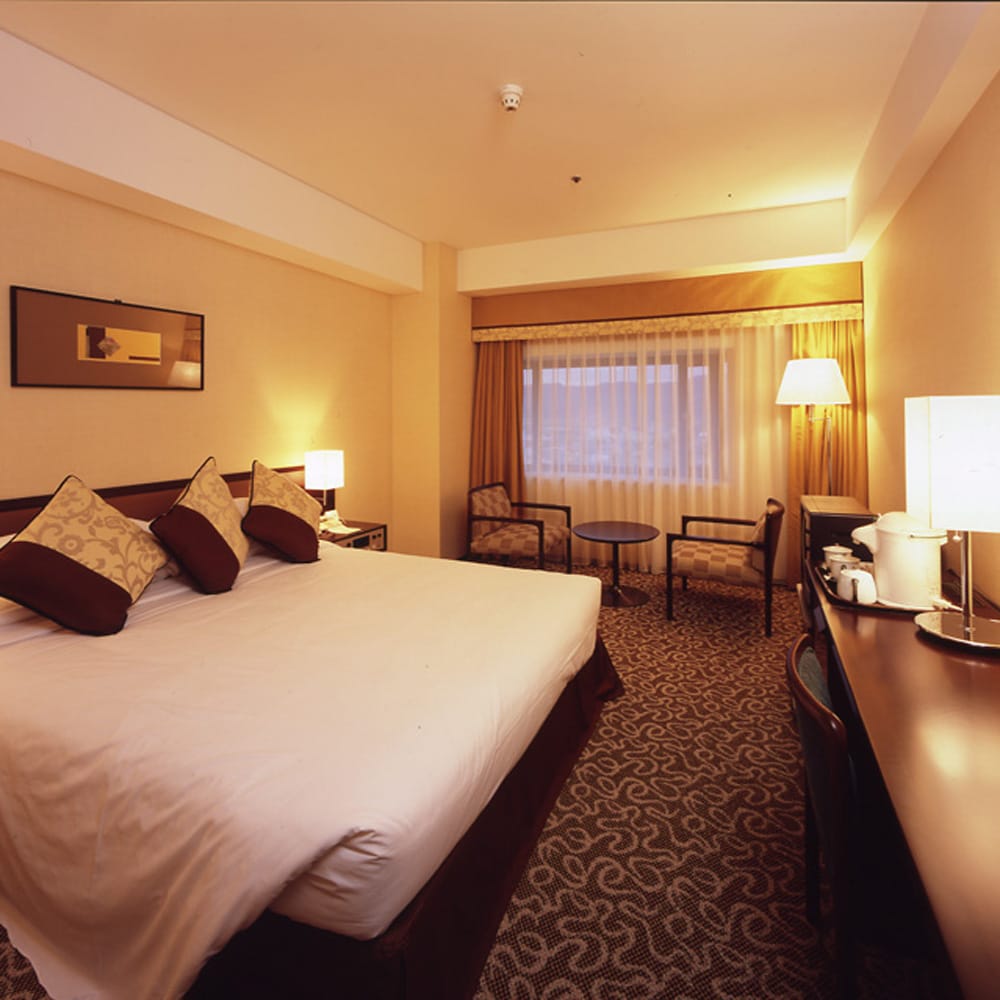 Superior double (lantai 9 hingga 12) Ukuran: 26 meter persegi Lebar tempat tidur: 200cm×160cm