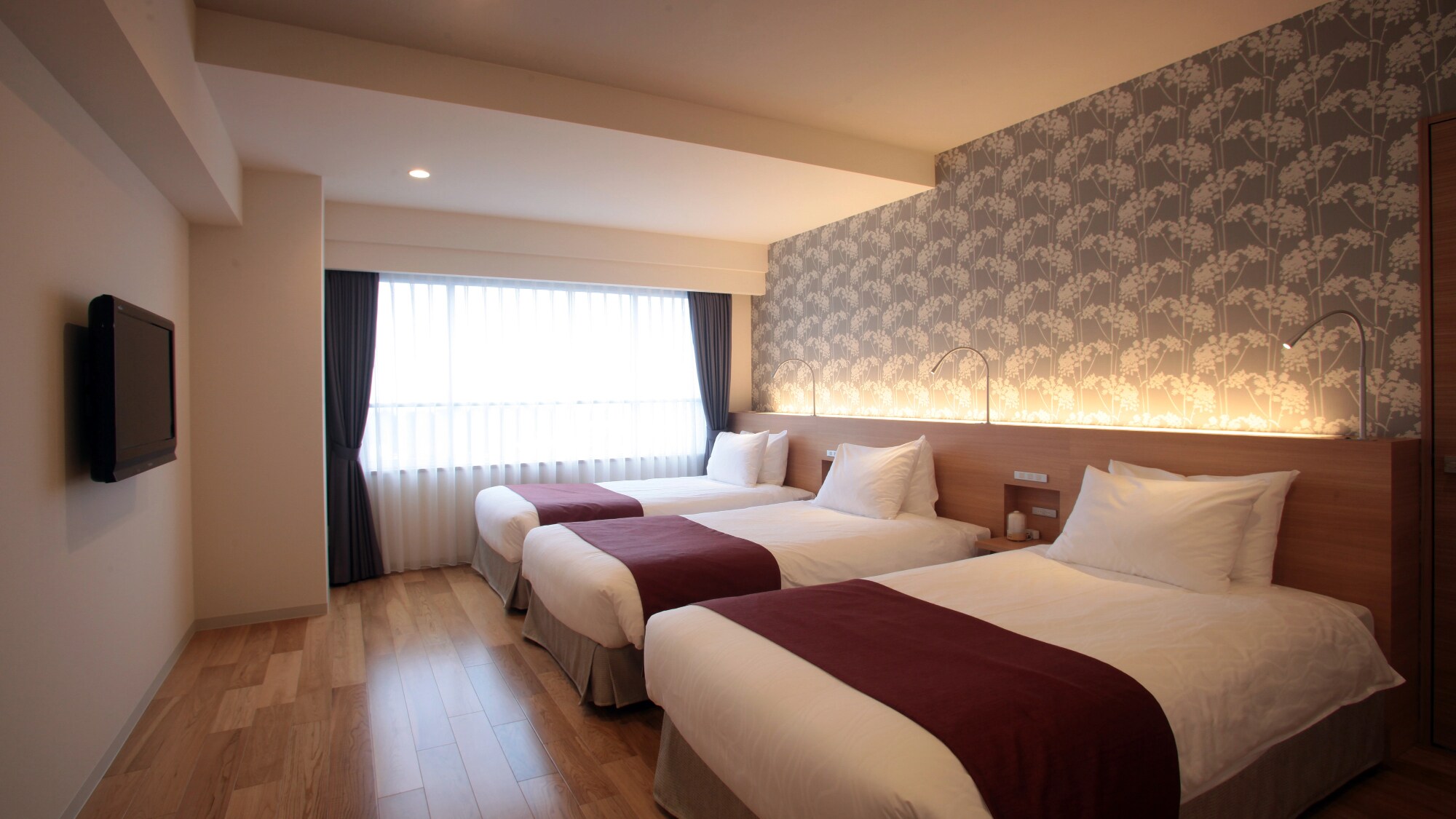 [Example of a Standard Triple Room] This room is equipped with three single-sized beds instead of an extra bed.