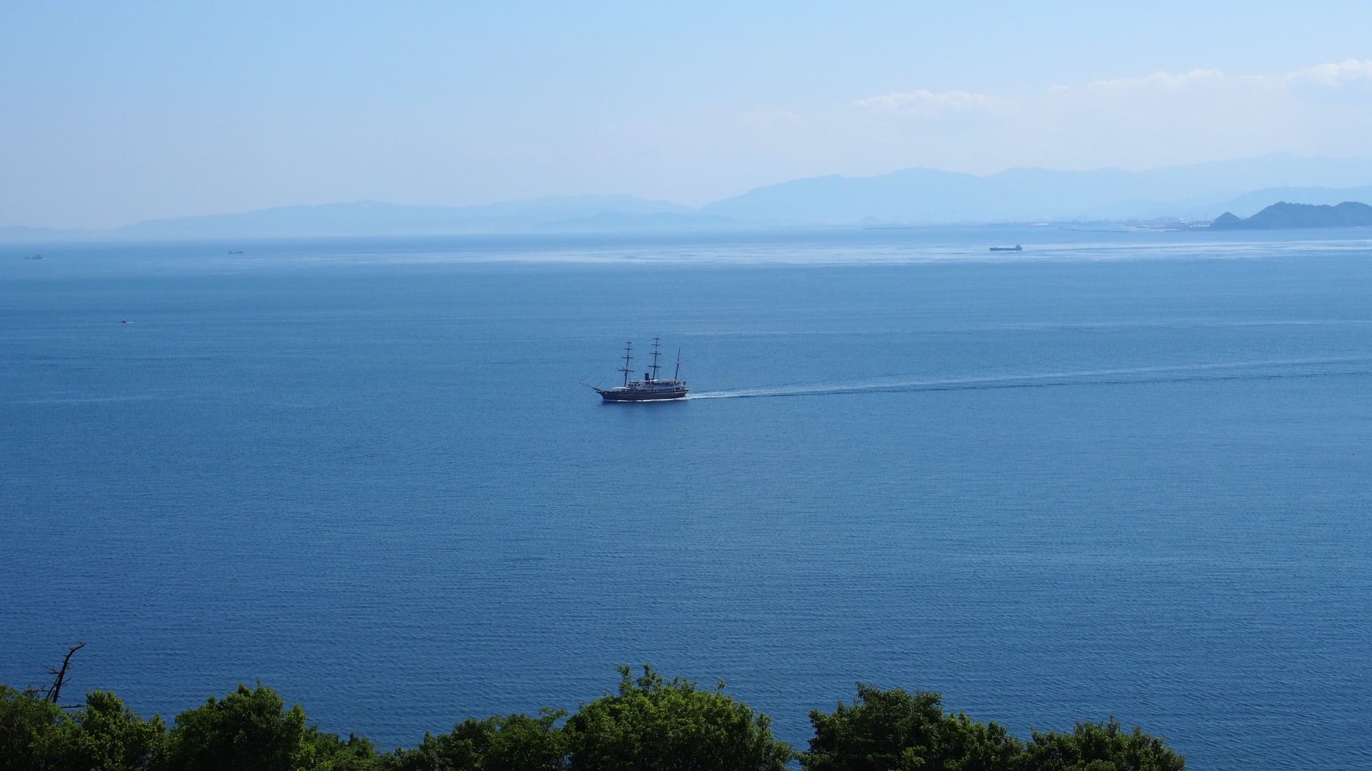 [Example of ocean-facing guest room view] You can see whirlpool cruise ships passing by.