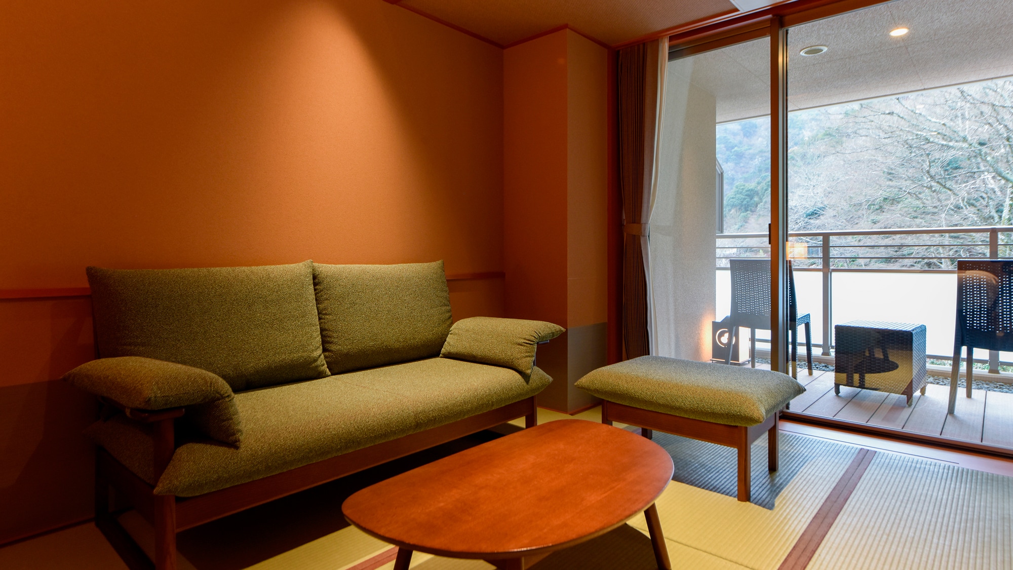 [Main building, Japanese-style room A with private source] Japanese-style room with twin beds, sofa and terrace.