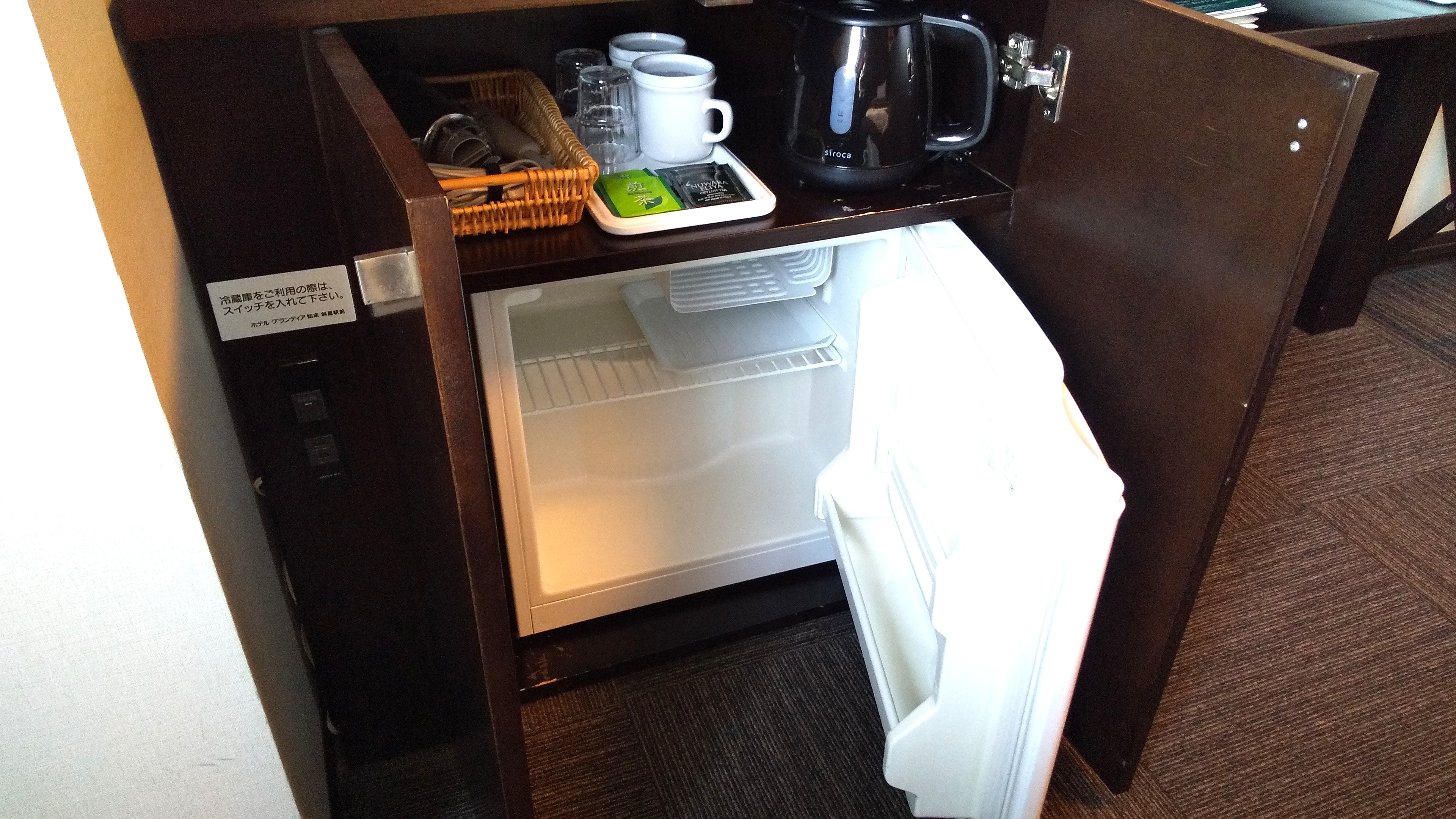 A mini fridge, hairdryer and electric kettle are also provided in the guest rooms.