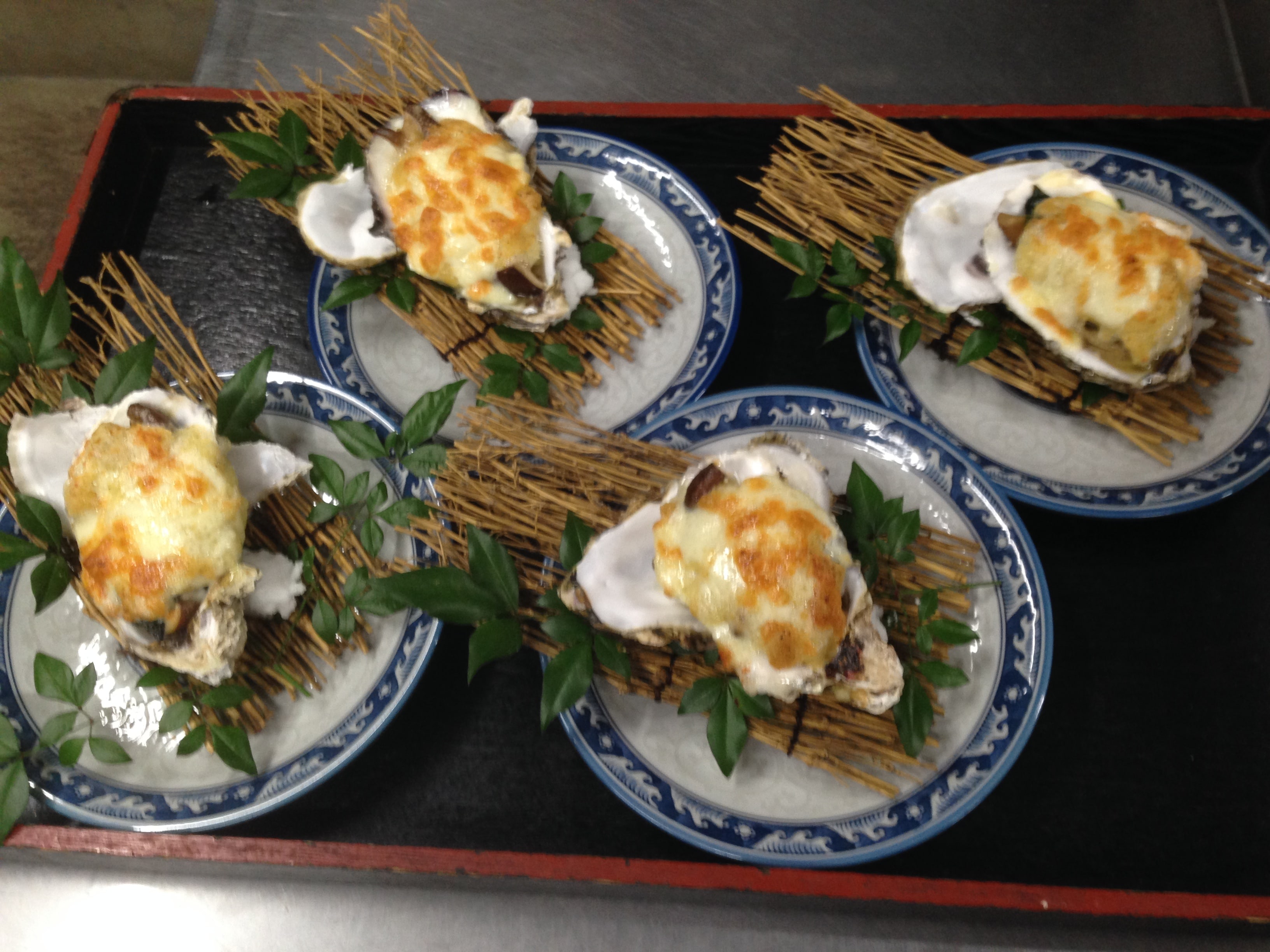Oyster and cheese on a plain crust