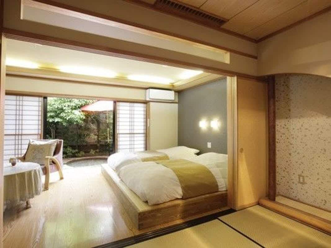 Kamar tamu dengan kamar mandi terbuka Yumeden Kamar Jepang dan Barat Twin