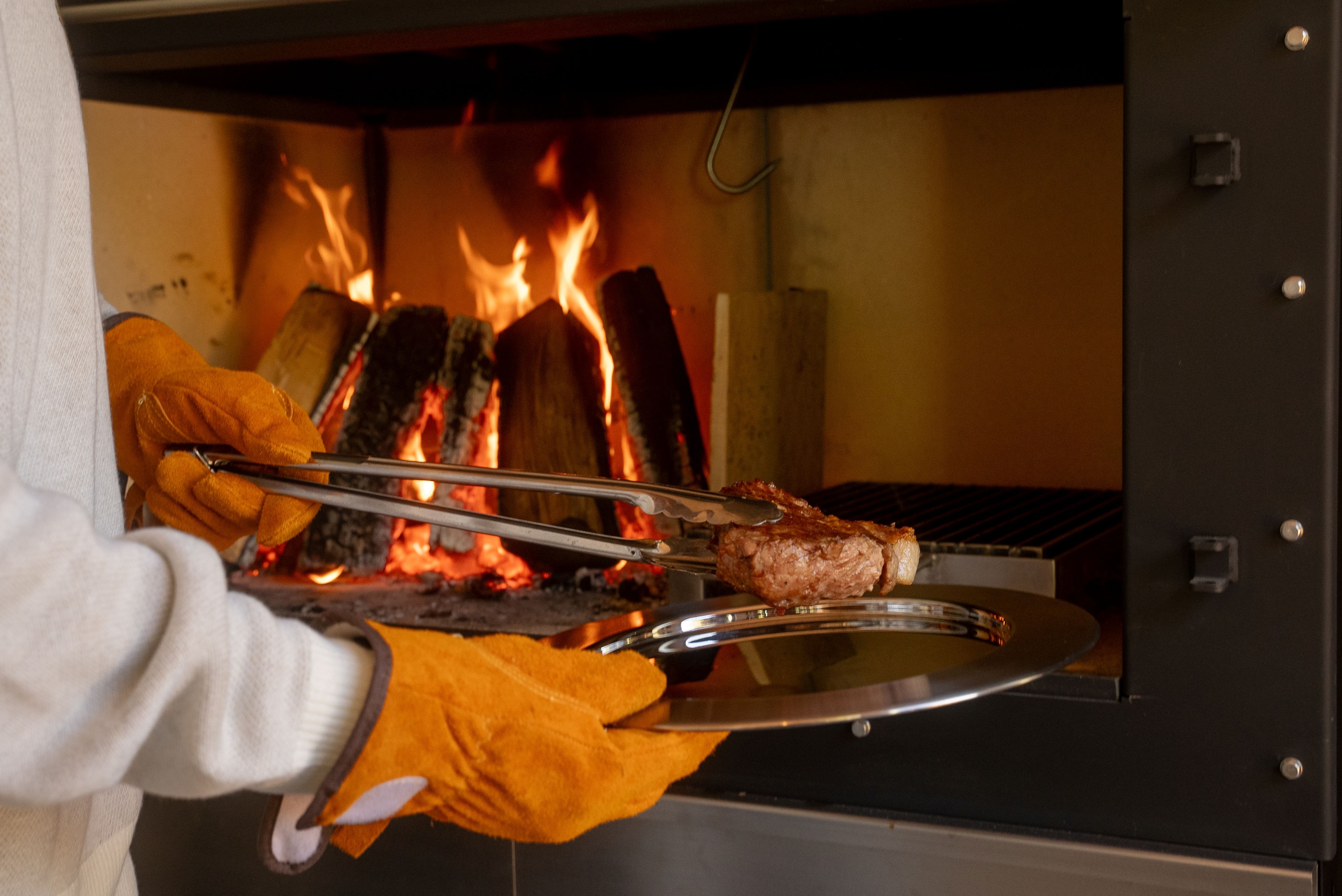 Wood-fired grill and meat