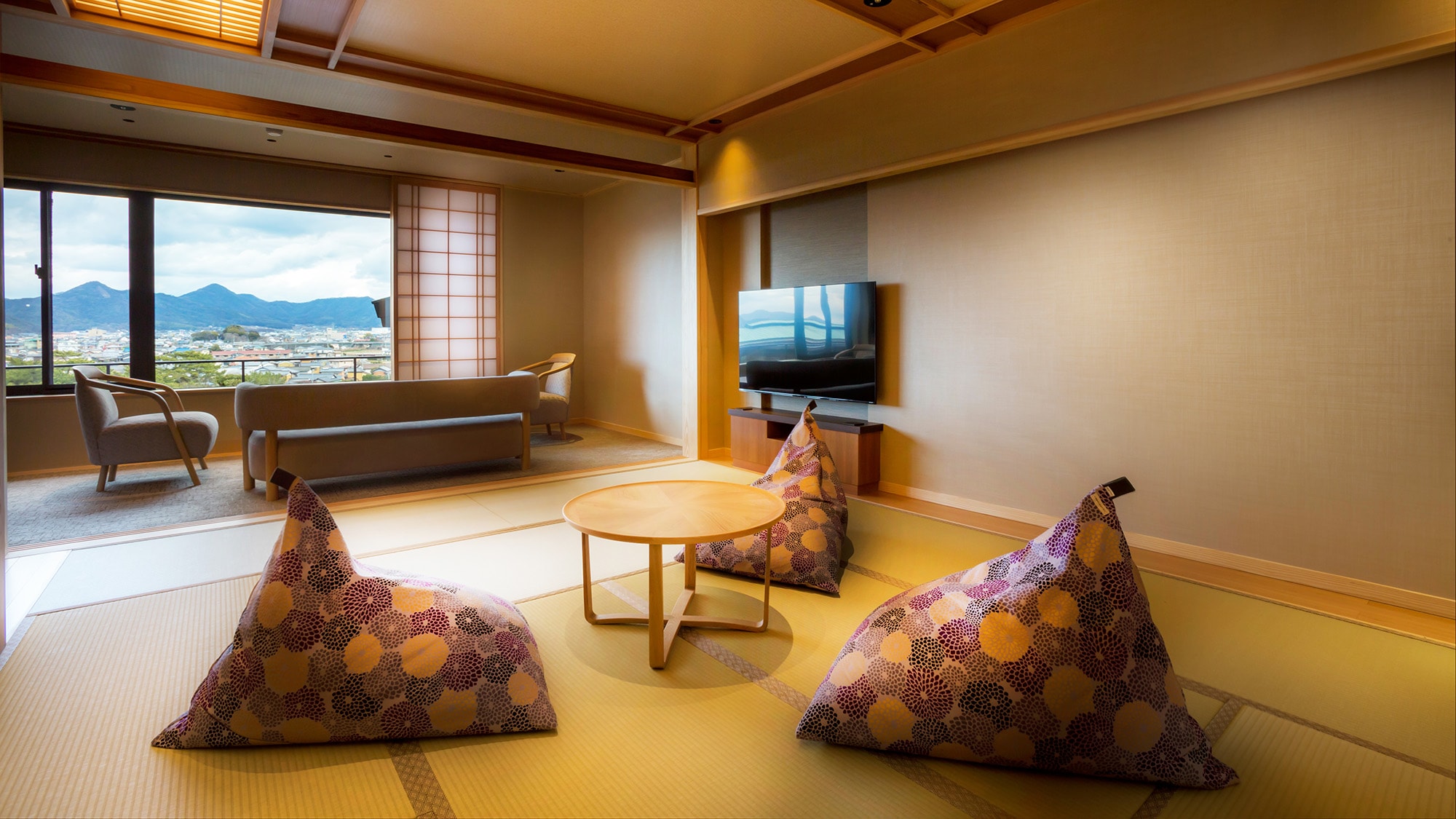 [Sansui-kaku/Japanese-Western room with private open-air bath D] A spacious living space that combines Japanese and Western styles