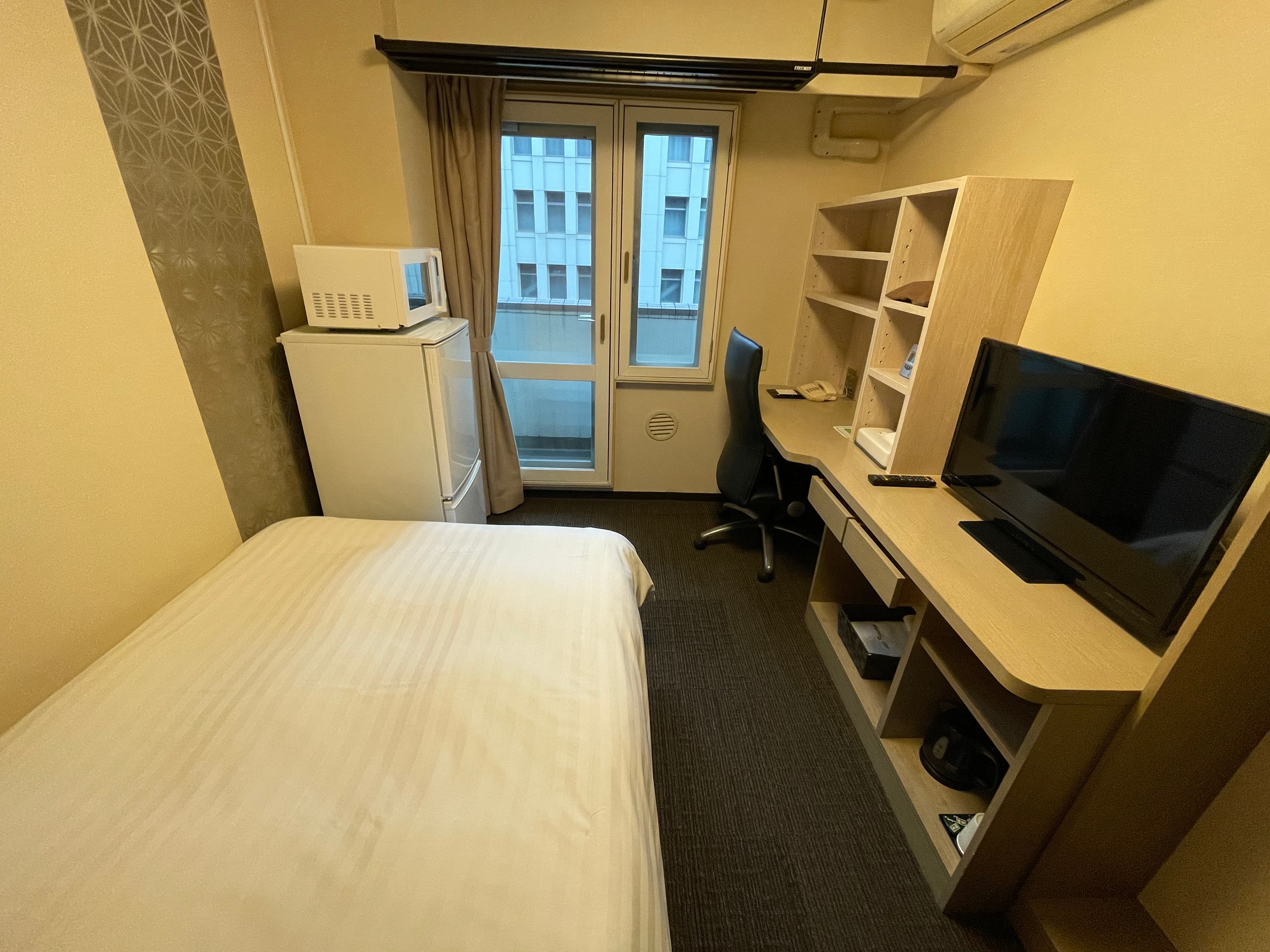 Residential semi-double 16 sqm equipped with refrigerator and microwave