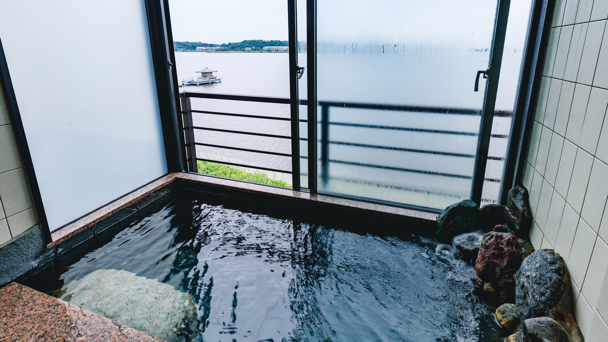 Guest room with hot spring rock bath