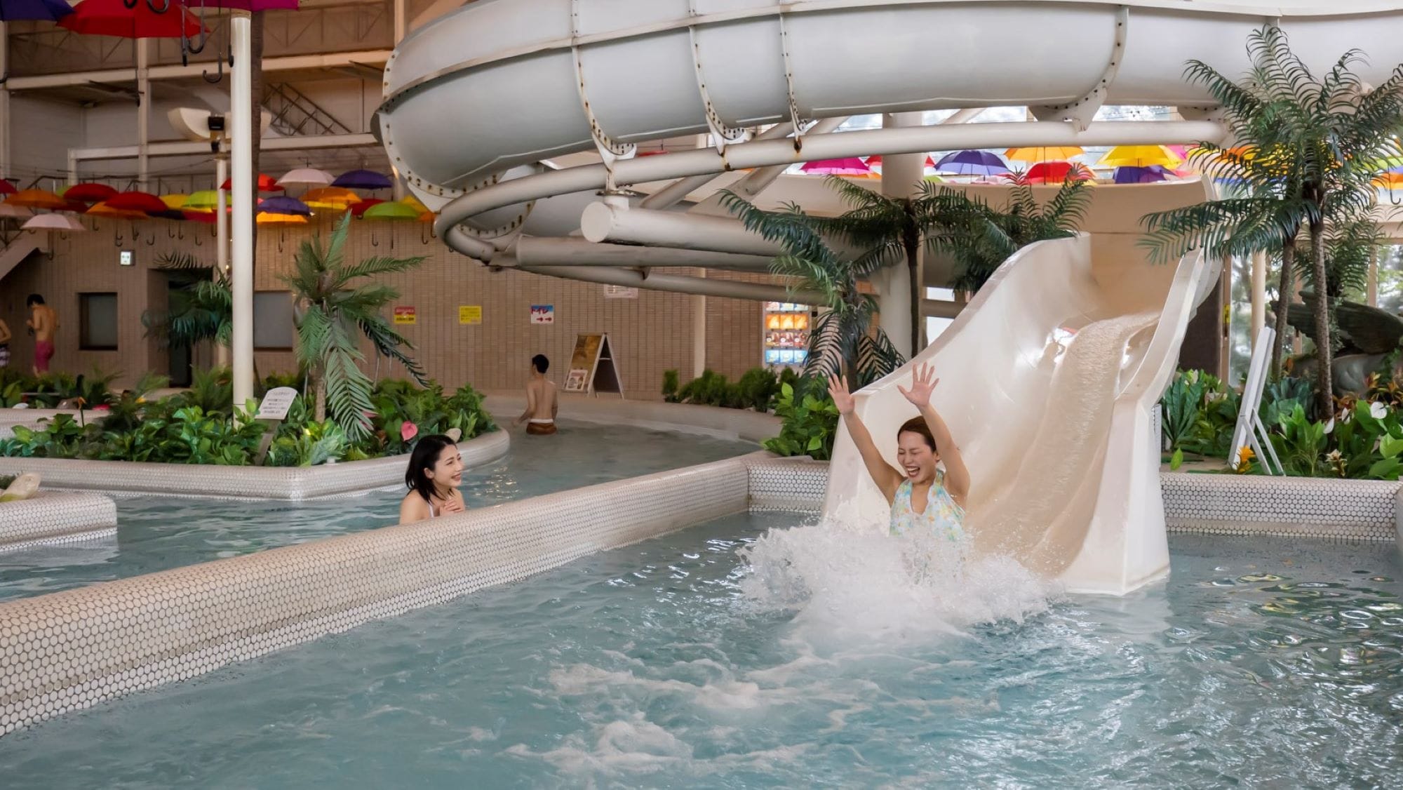 * [Aqua Pool (example)] A thrilling slide! Have fun!