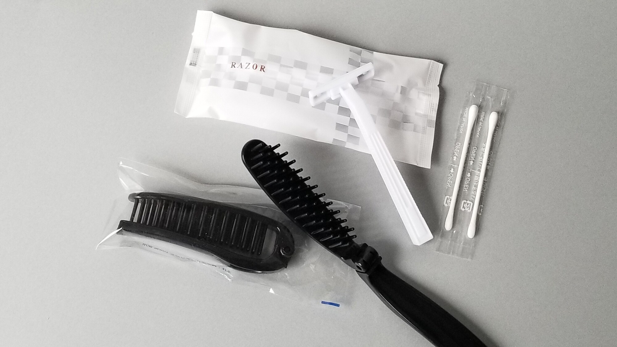 Razor, hairbrush, cotton swabs (provided at the front lobby)