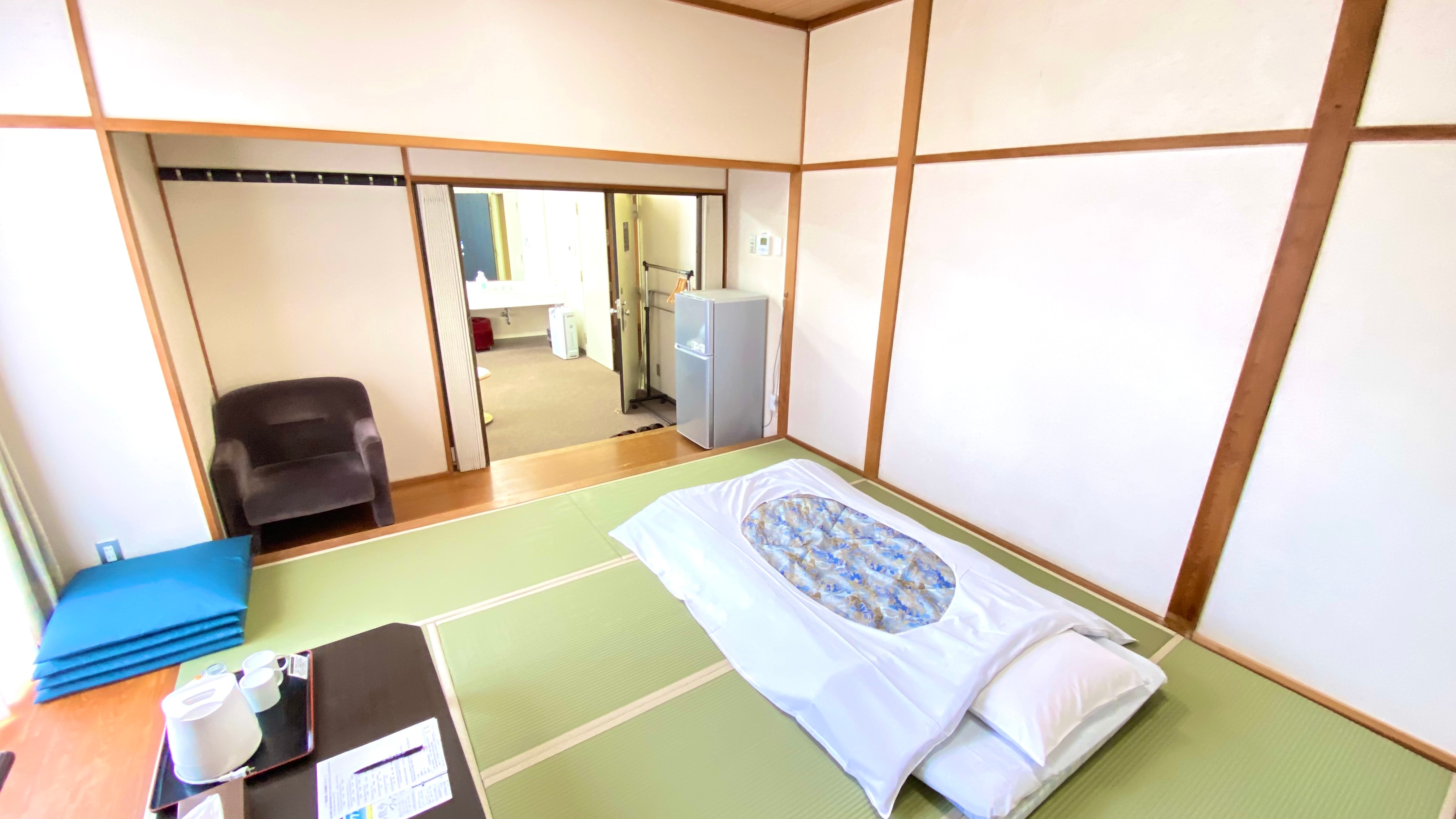 Japanese-Western style room with one double bed and separate tatami space.