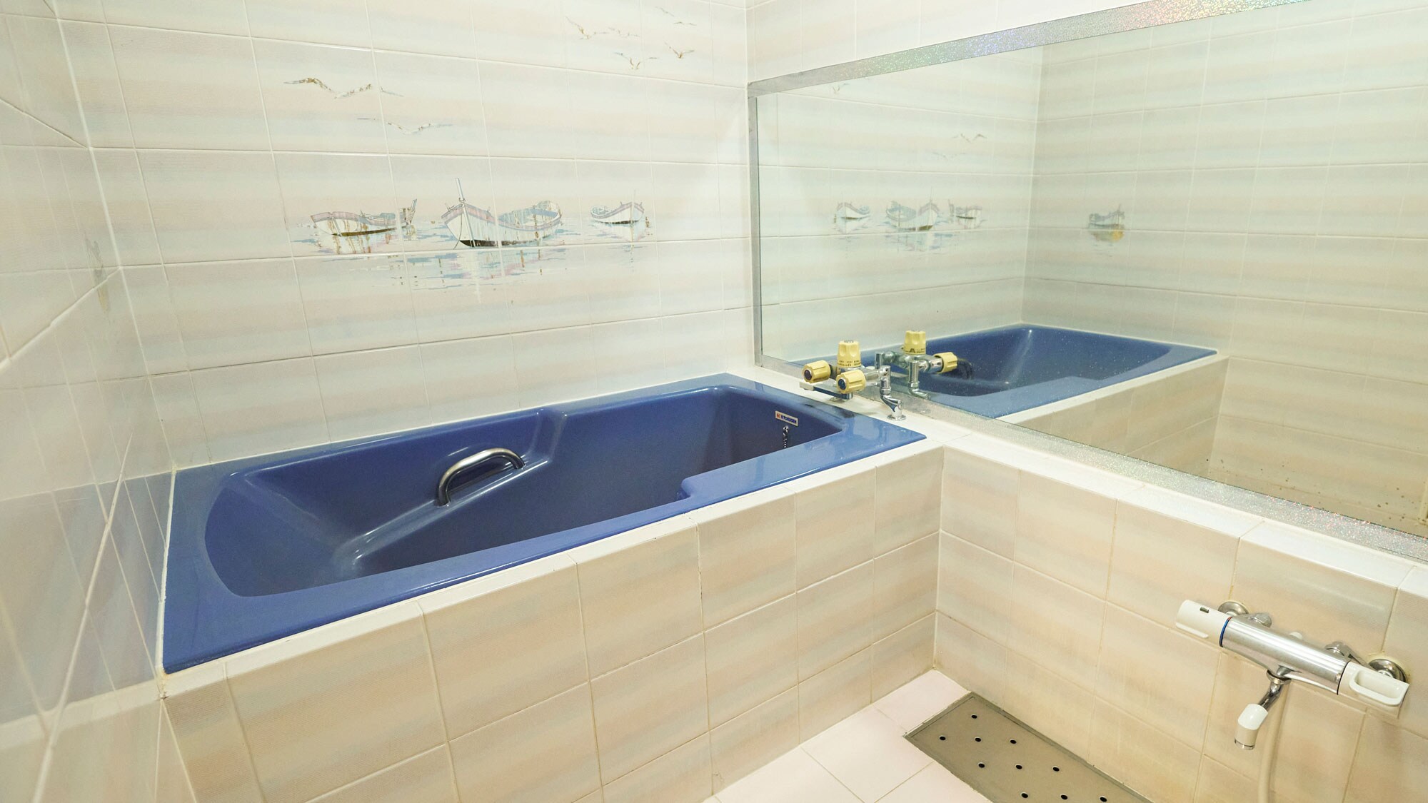 An example of a bathroom *The double and twin rooms have separate baths, sinks, and toilets.
