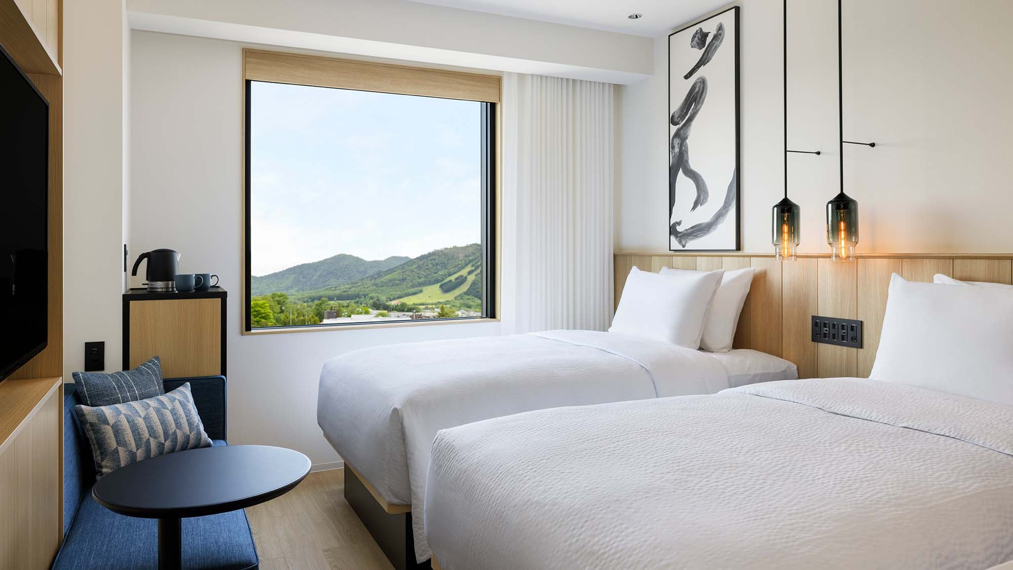 双床房：21平方米，无烟，床宽120厘米，在简约而温馨的空间中放松身心。