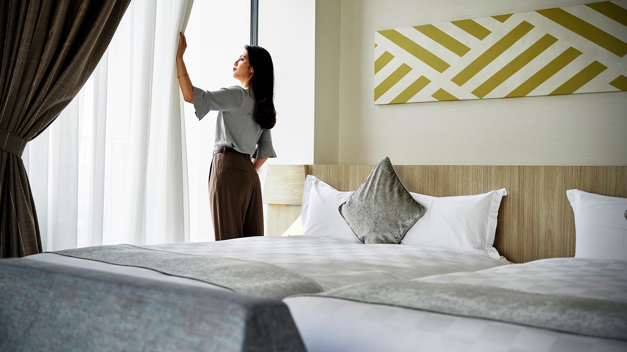 Enjoy the ultimate in relaxation in a cozy room where natural light pours in through the windows and a calm interior invites you.