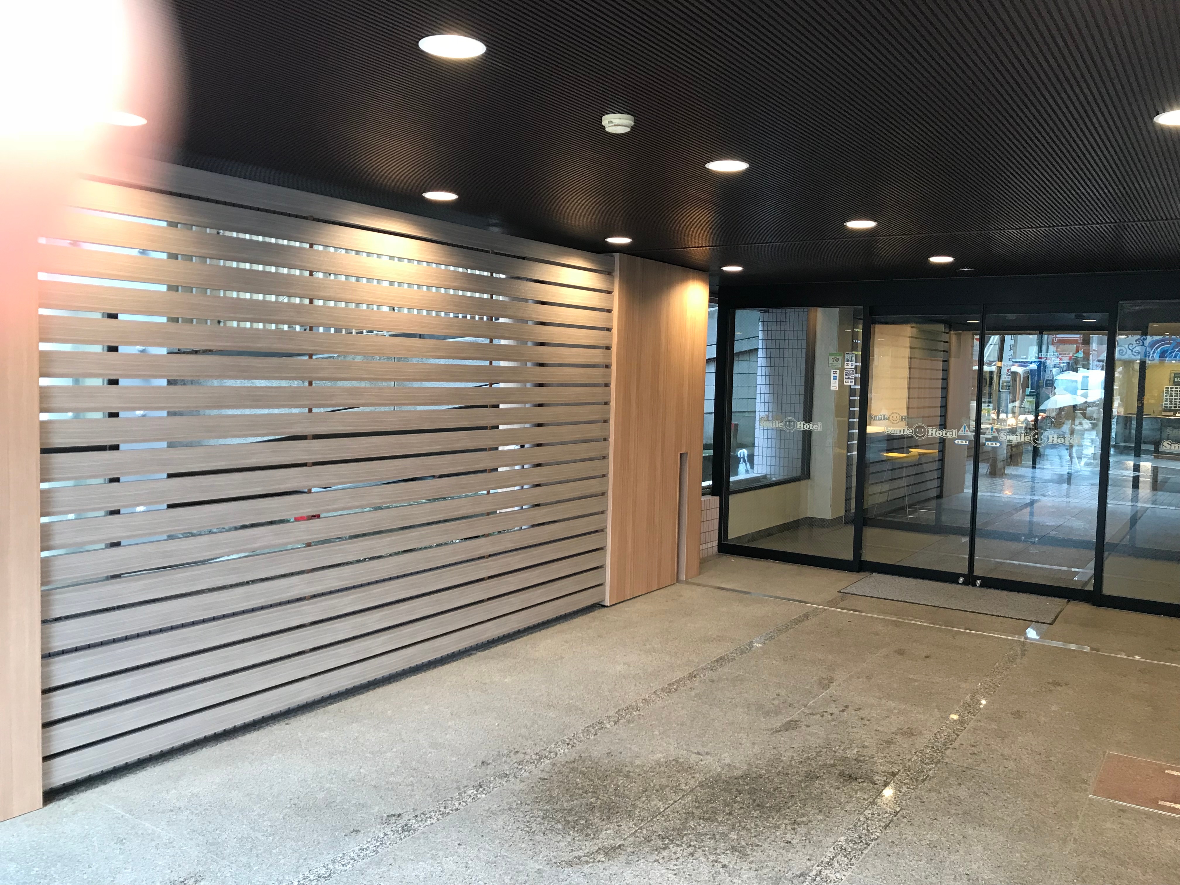 In front of the entrance