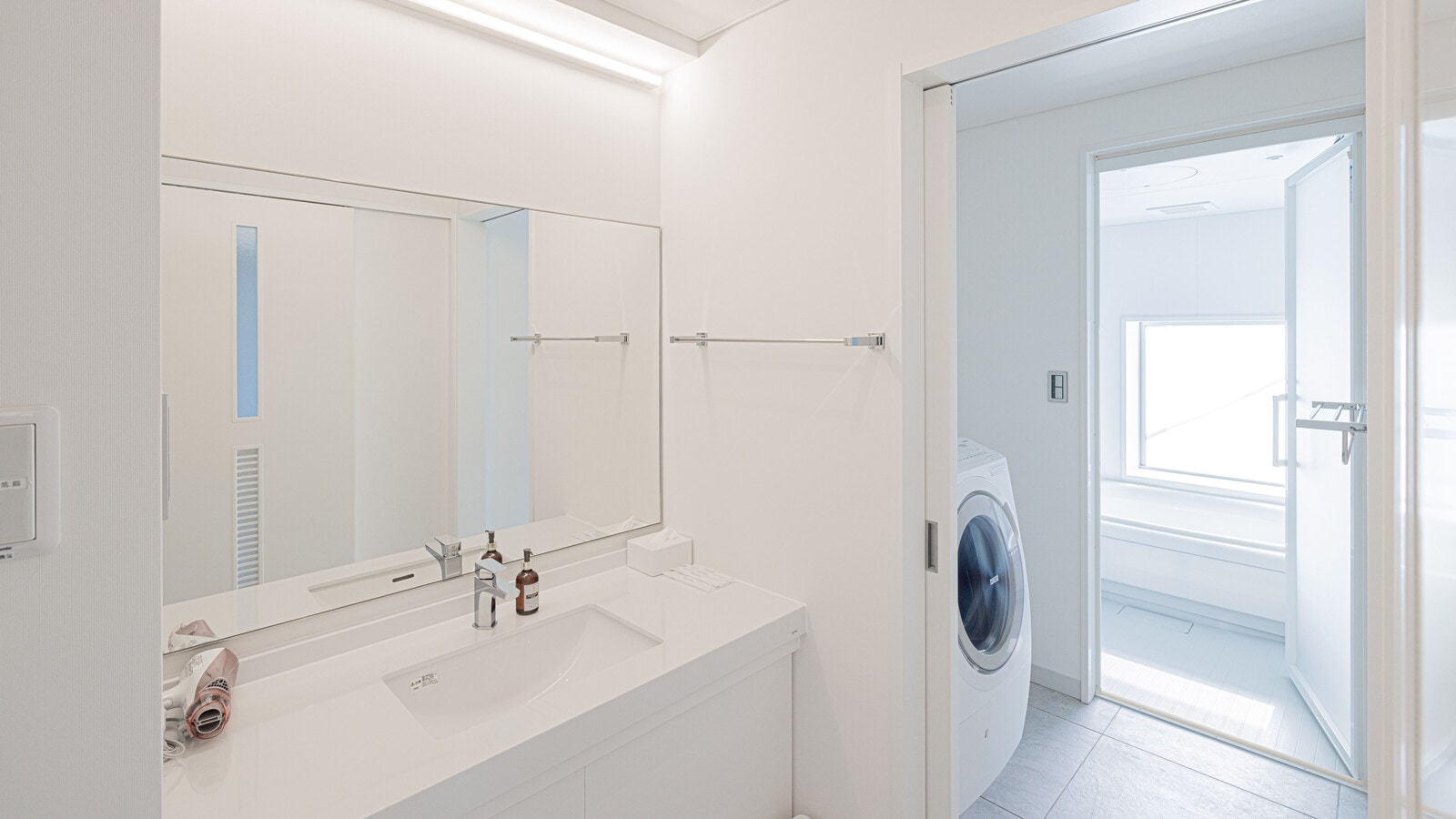 <Room 201 Family> Bathroom with washer/dryer