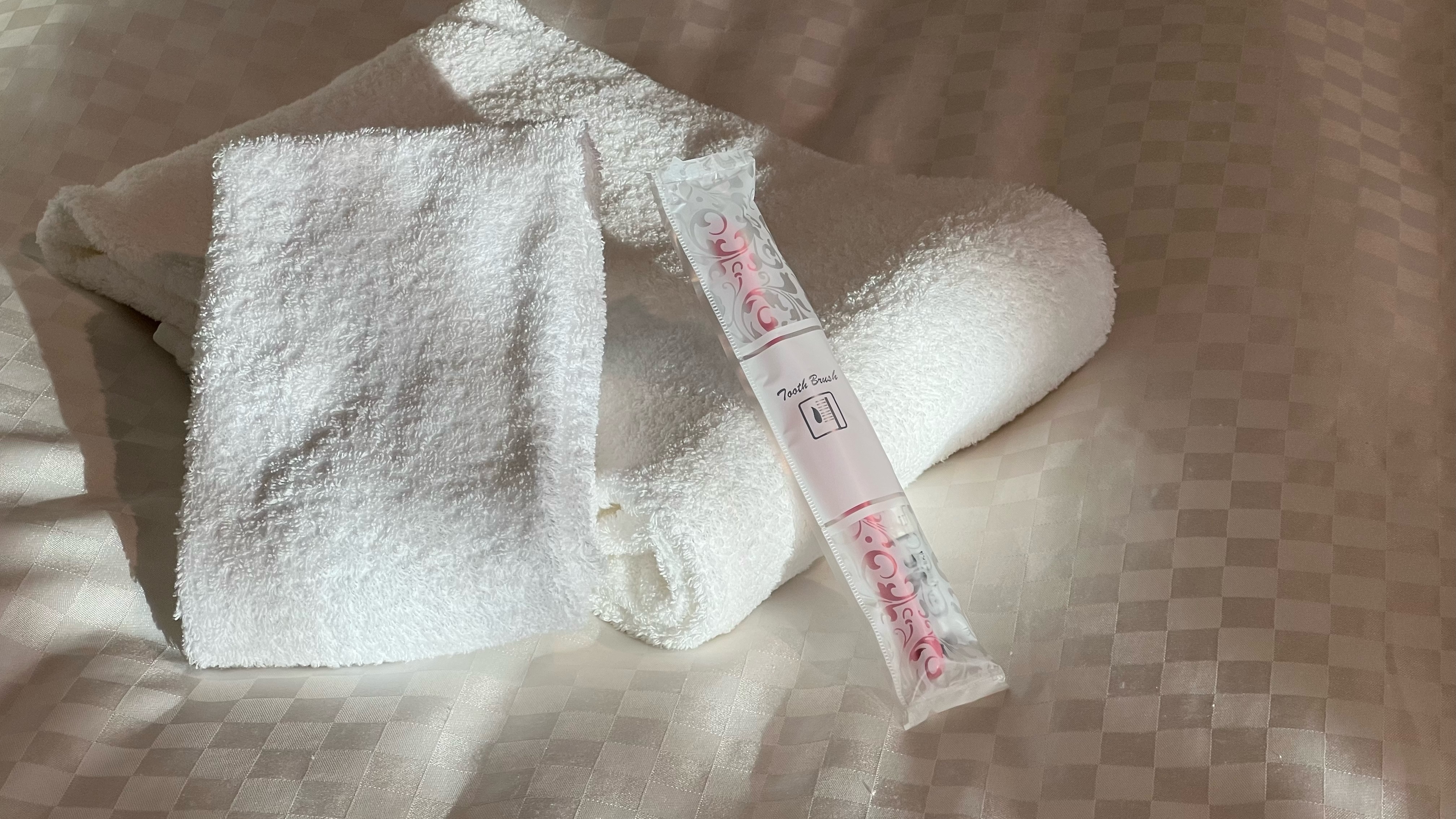 There are only towels and toothbrushes in the room. Other amenities are available in the lobby.