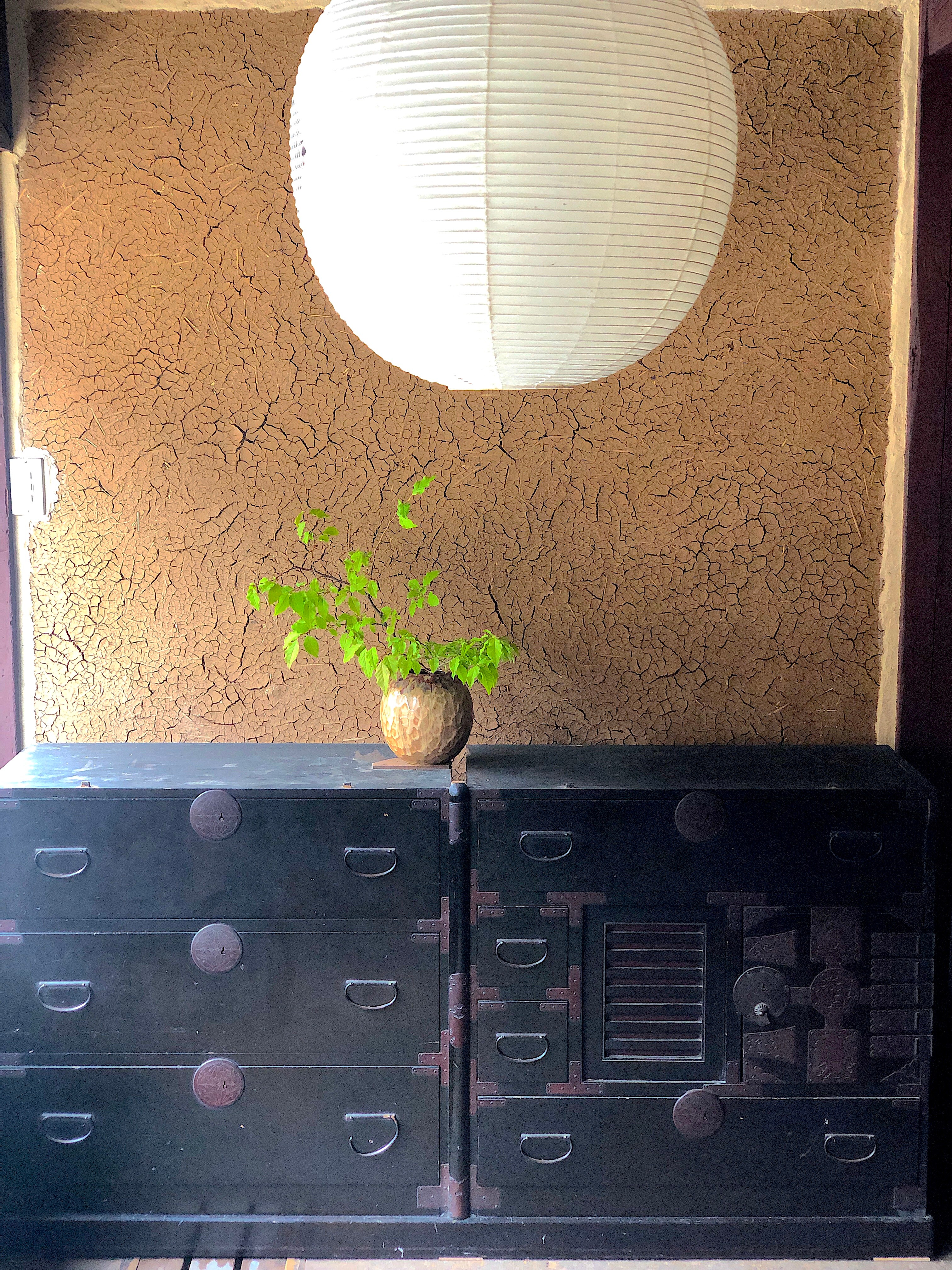 Earthen wall seen through a lantern