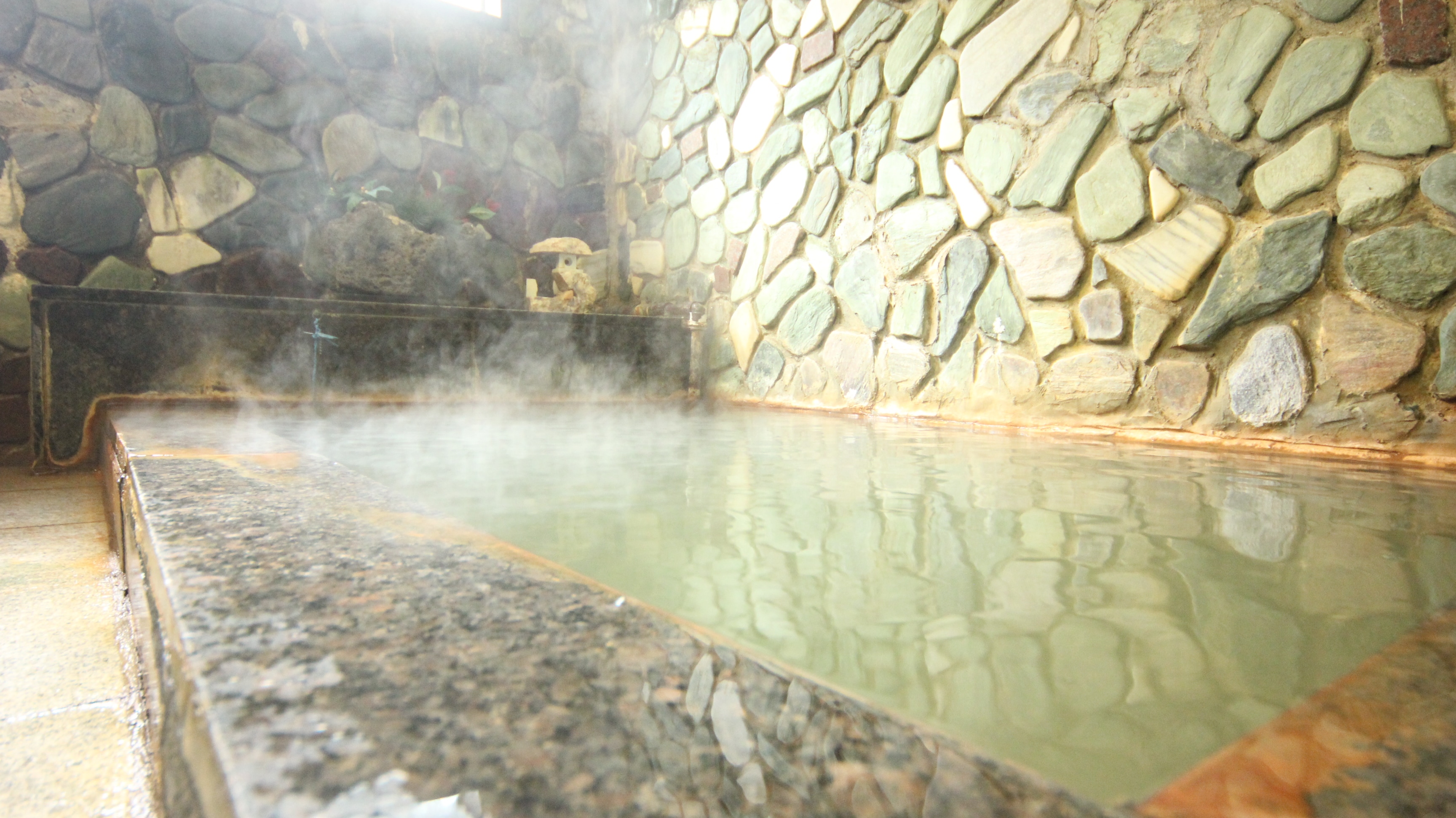 The bath is made from natural hot spring water