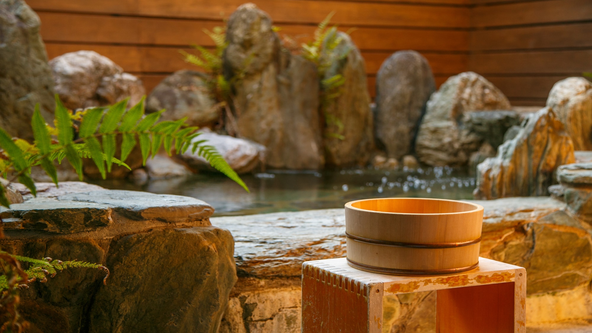 Relax and soothe your daily fatigue in a private open-air bath surrounded by natural stones.