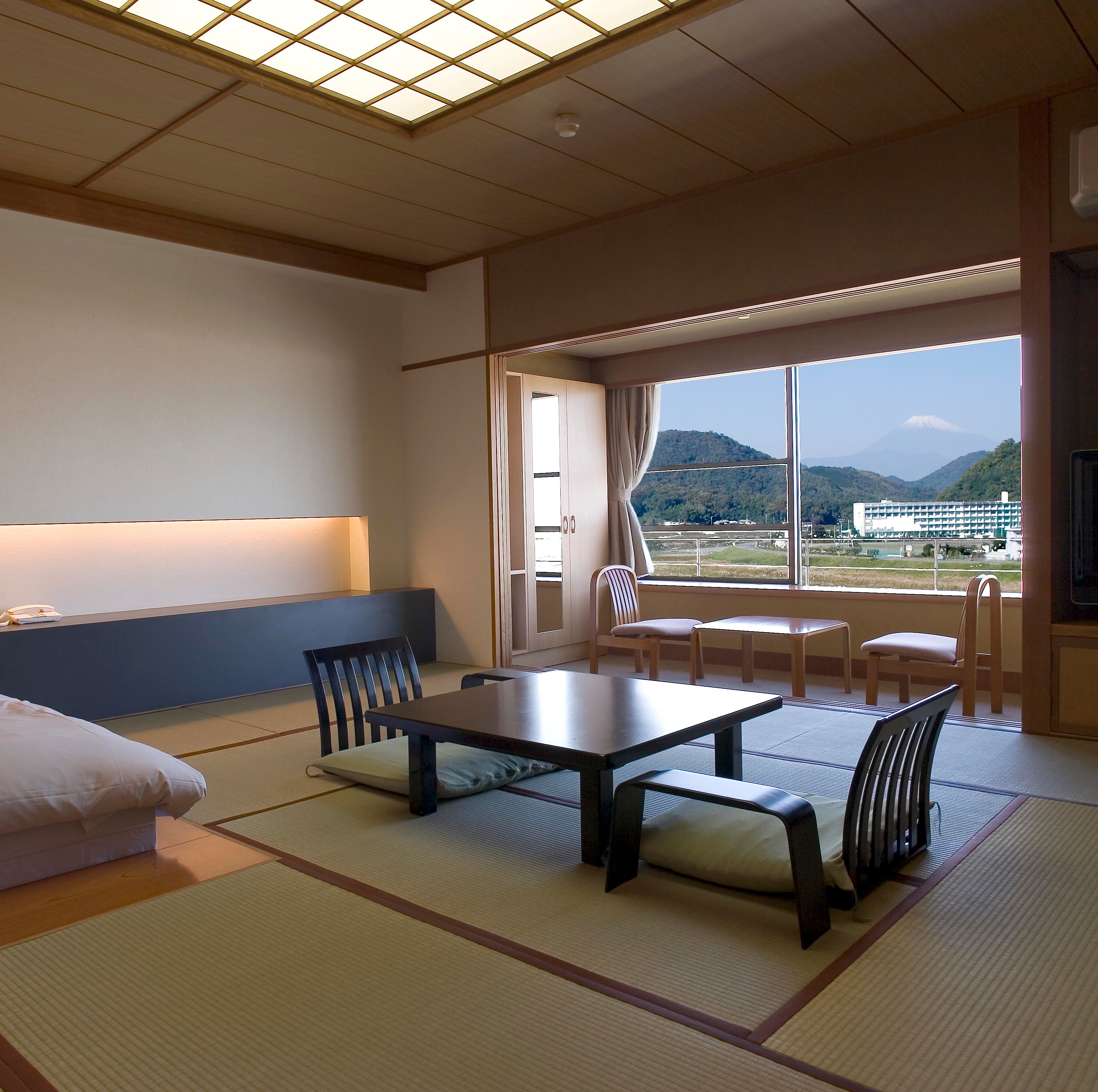 "Relaxing modern Japanese-style room overlooking Mt. Fuji" with a calm atmosphere