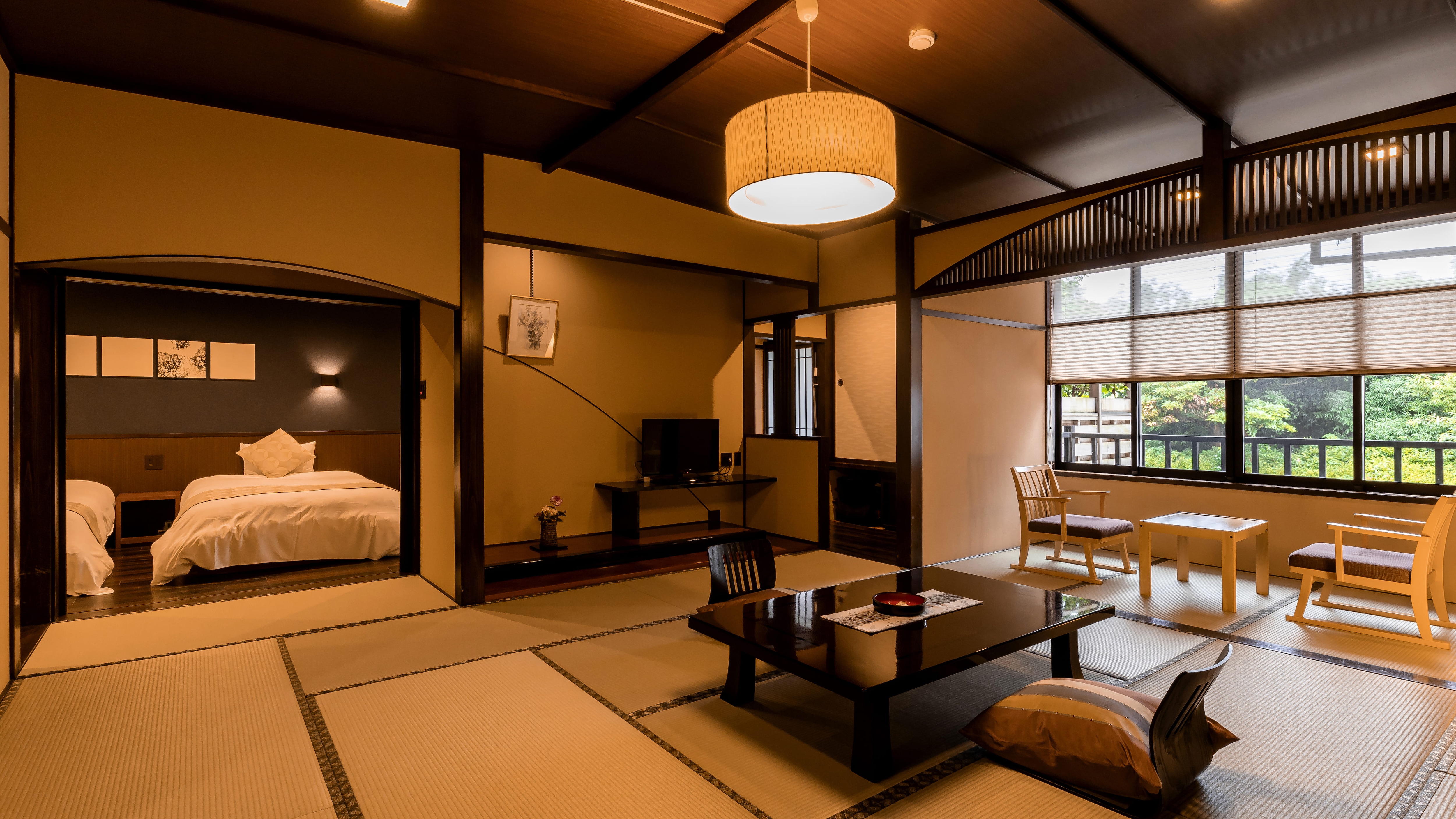 Kamar tamu modern Jepang dengan pemandian terbuka