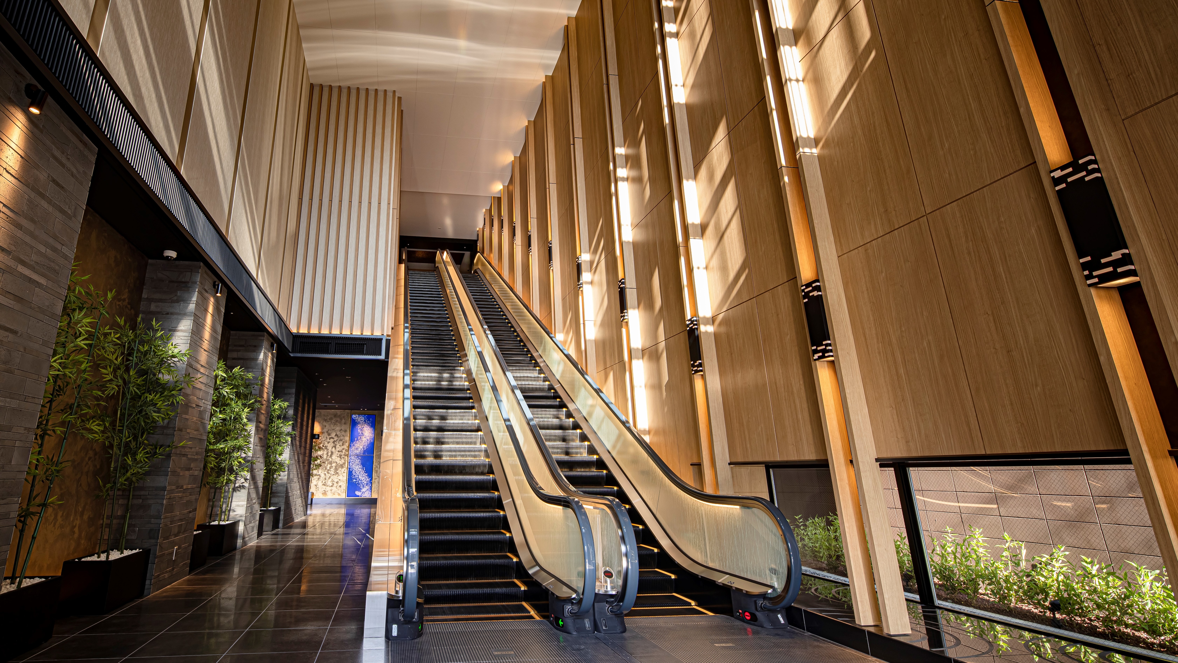 Escalator leading to the front desk on the 3rd floor
