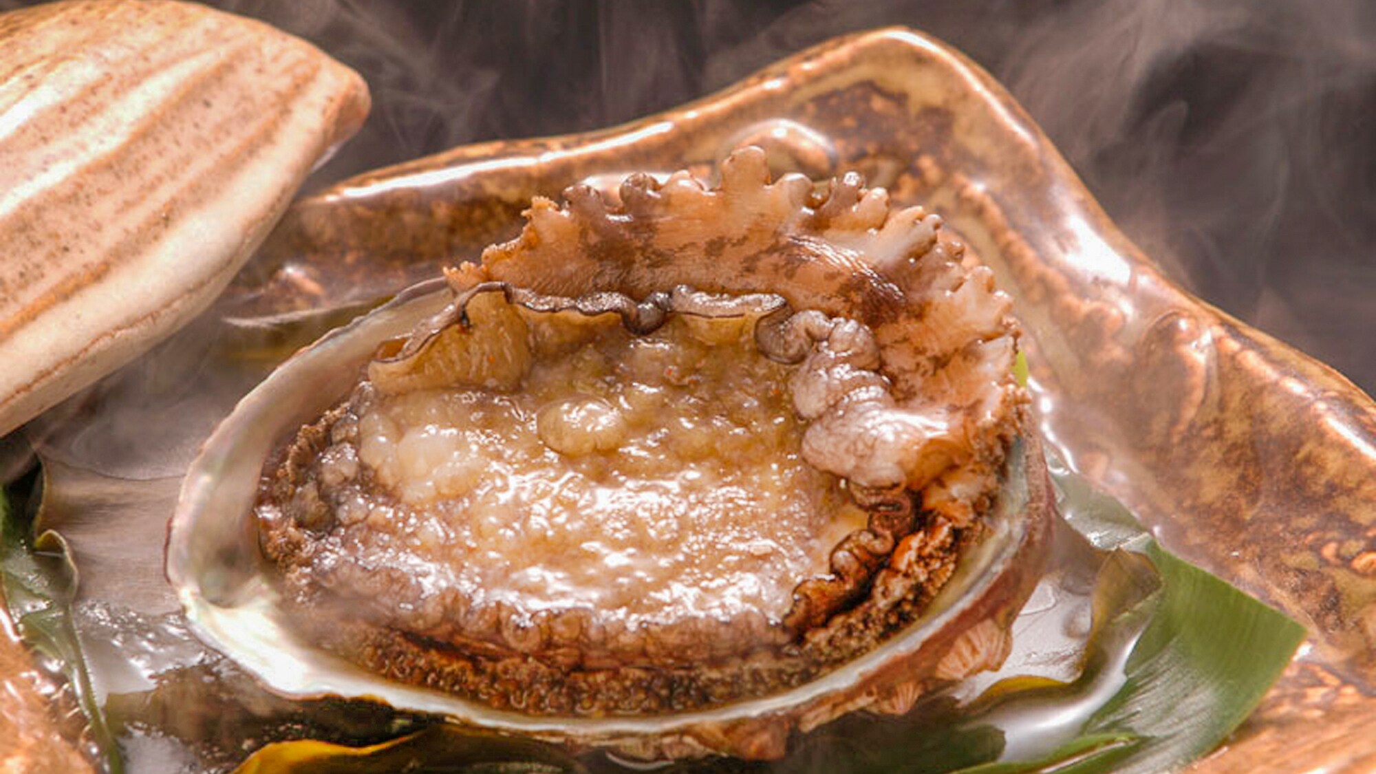 ■ Steamed abalone in sake