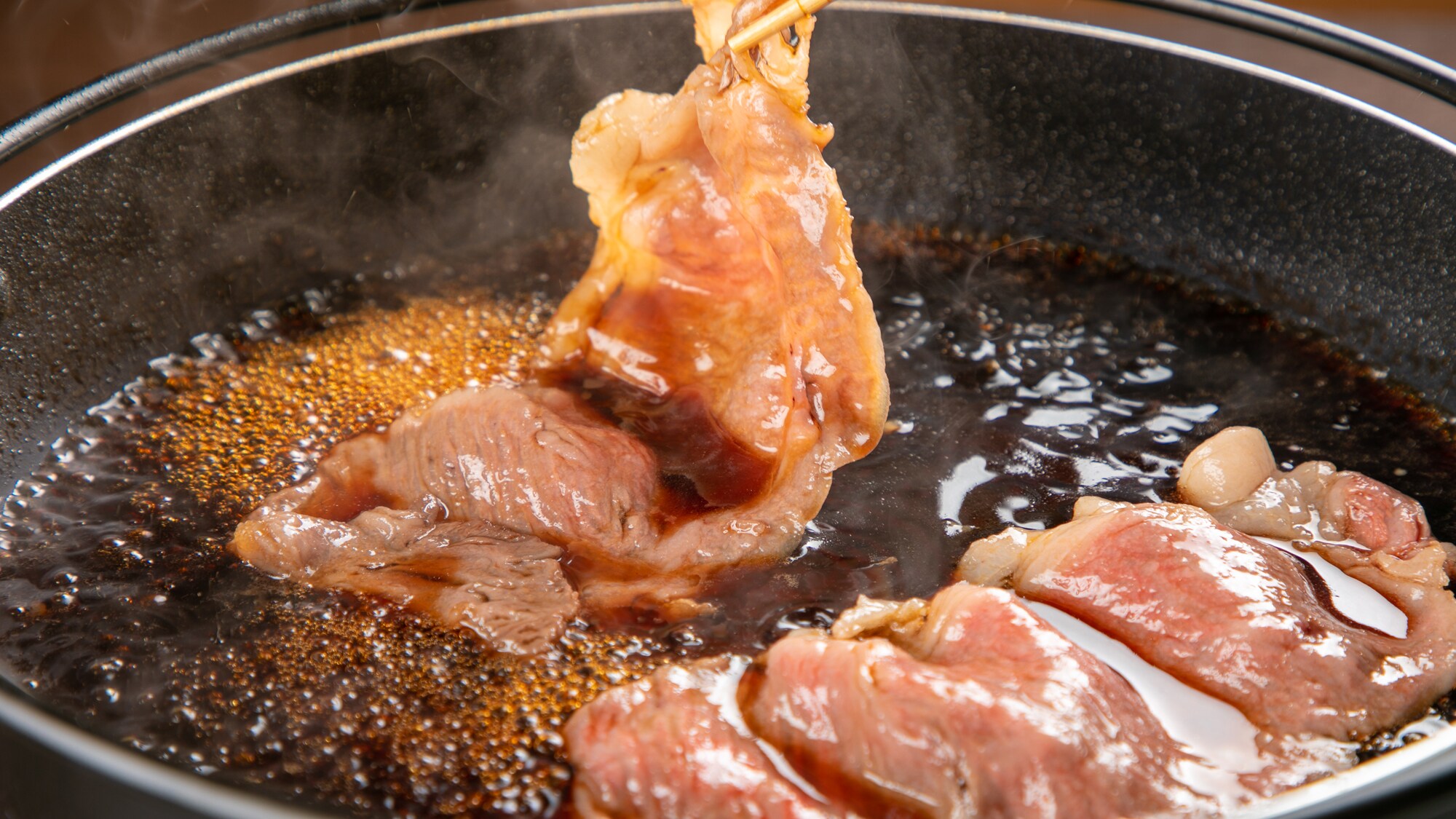 Enjoy the Wagyu beef layered with our special sauce.