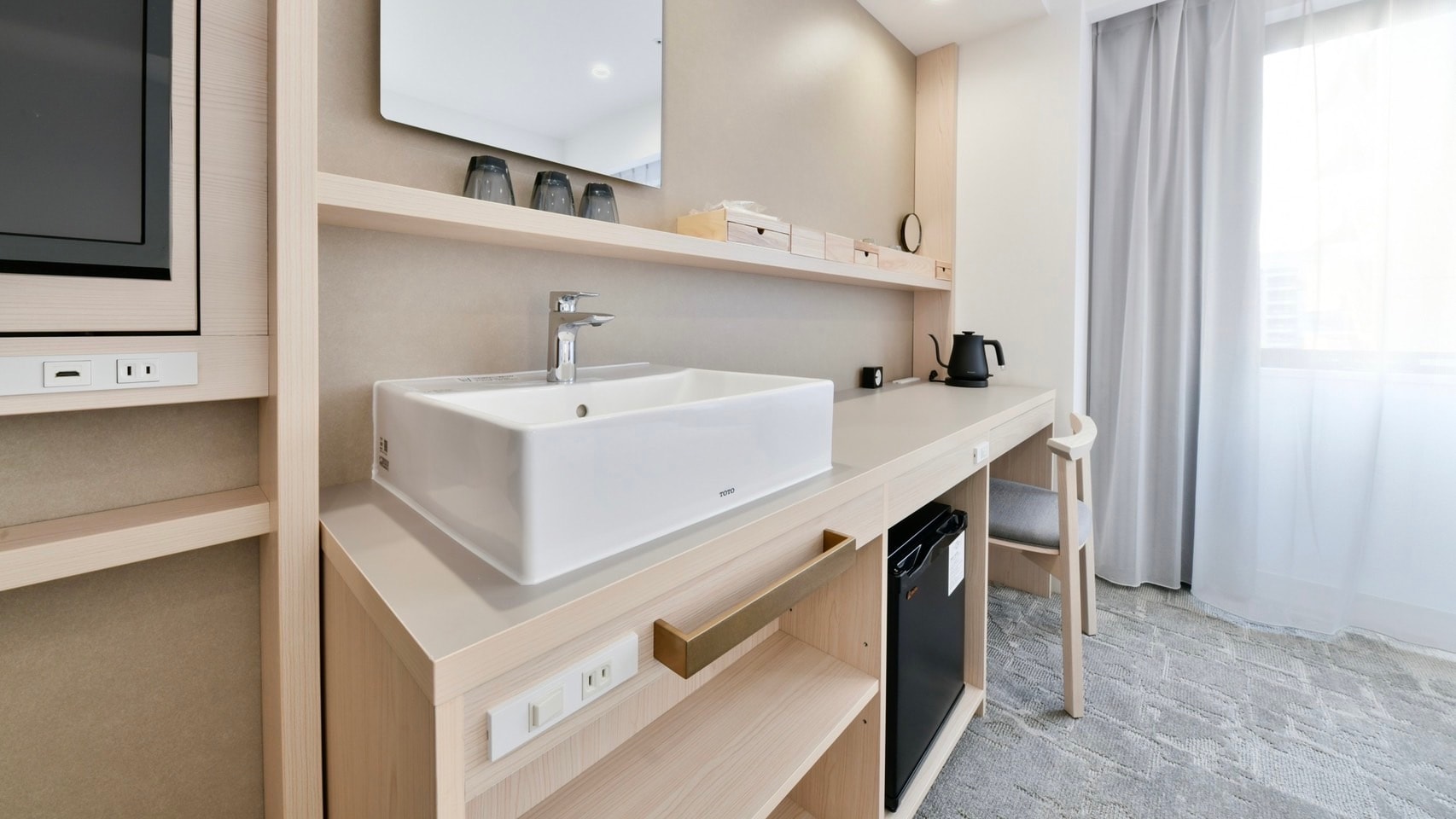 [Moderate Twin Room] The washbasin is located inside the room.