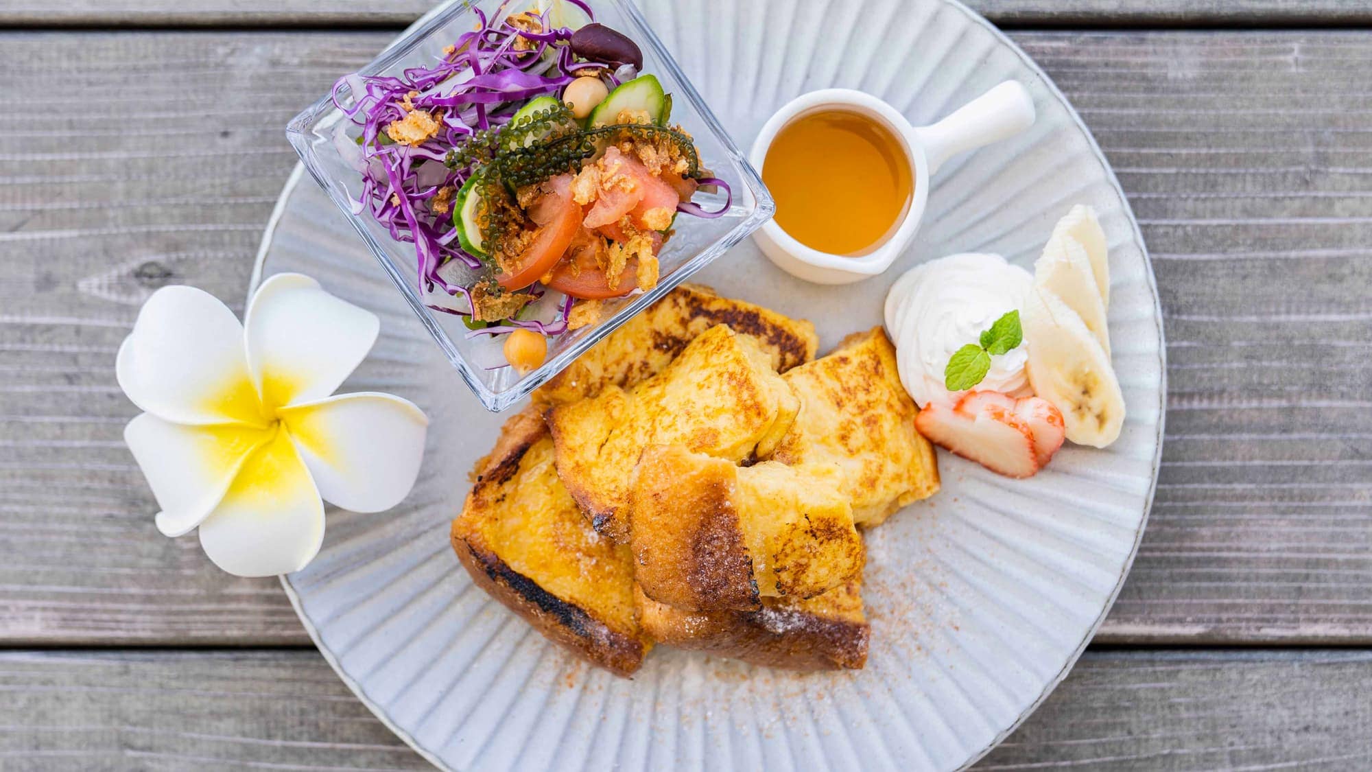 [Breakfast selection of plates and French toast]