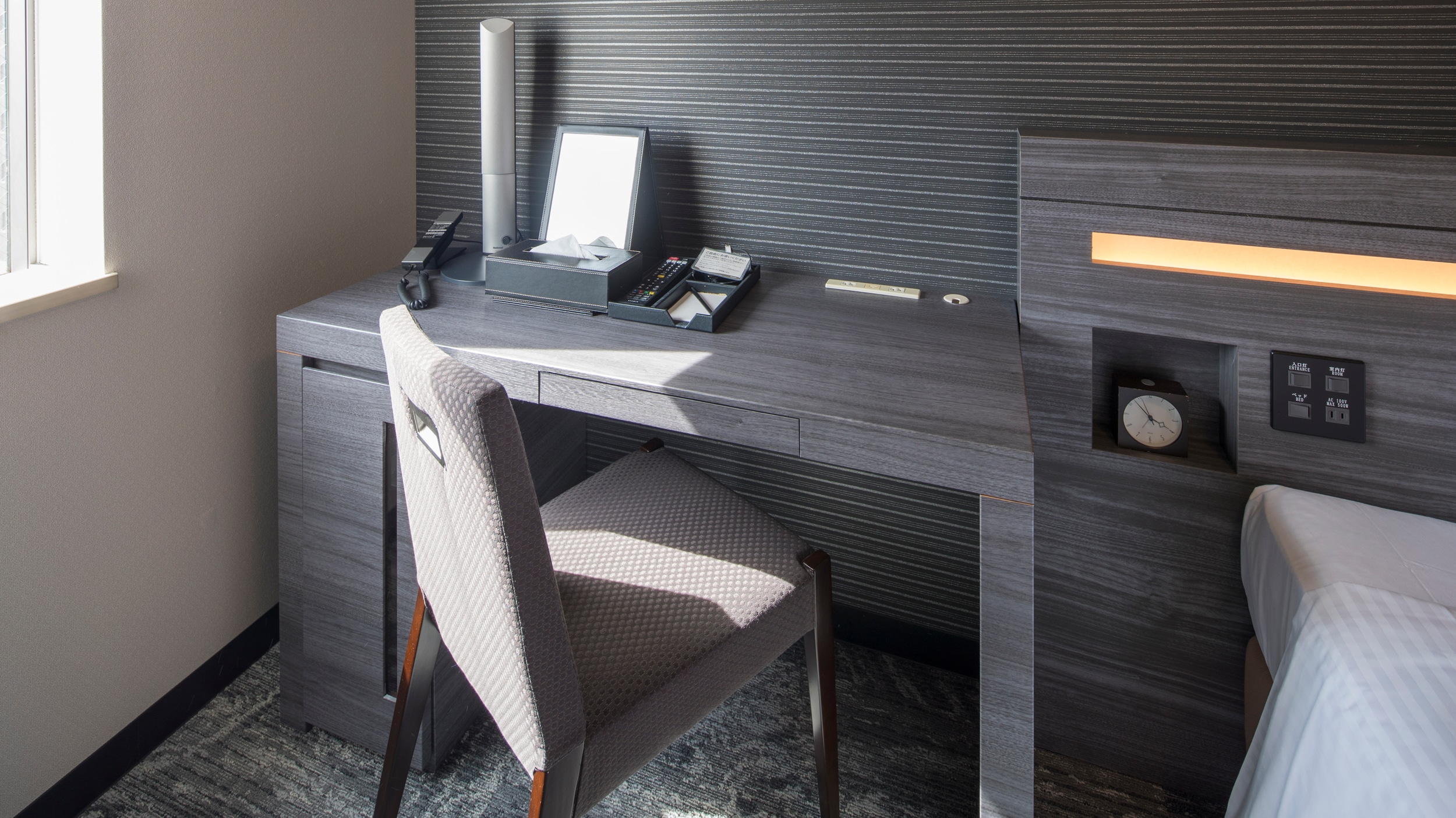 Corner double room with desk. The desk is by the window, giving you a sense of openness.