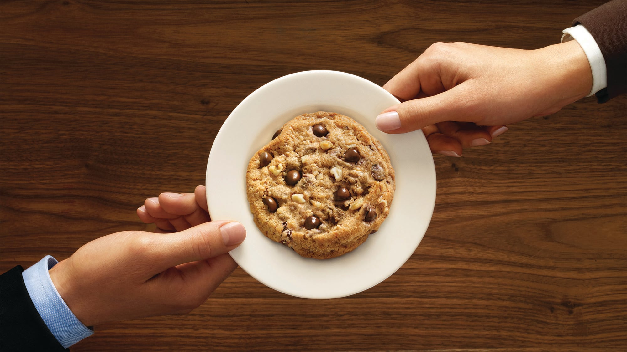 Chocolate chip cookies offered to arriving guests