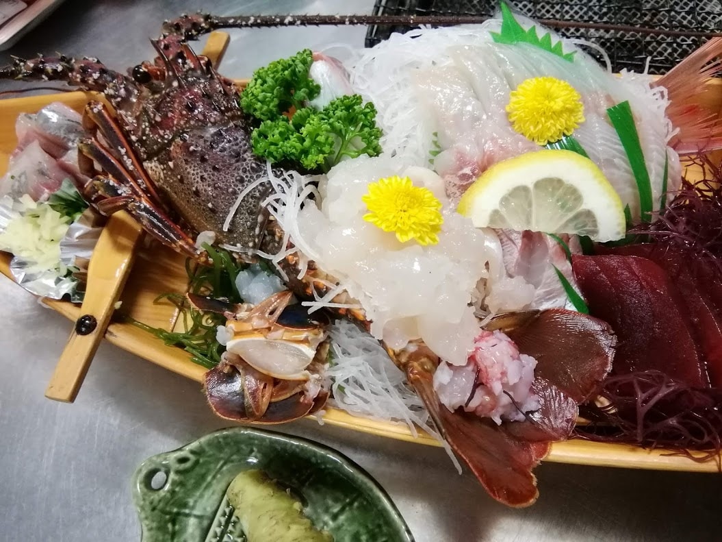 Boat-style serving of spiny lobster