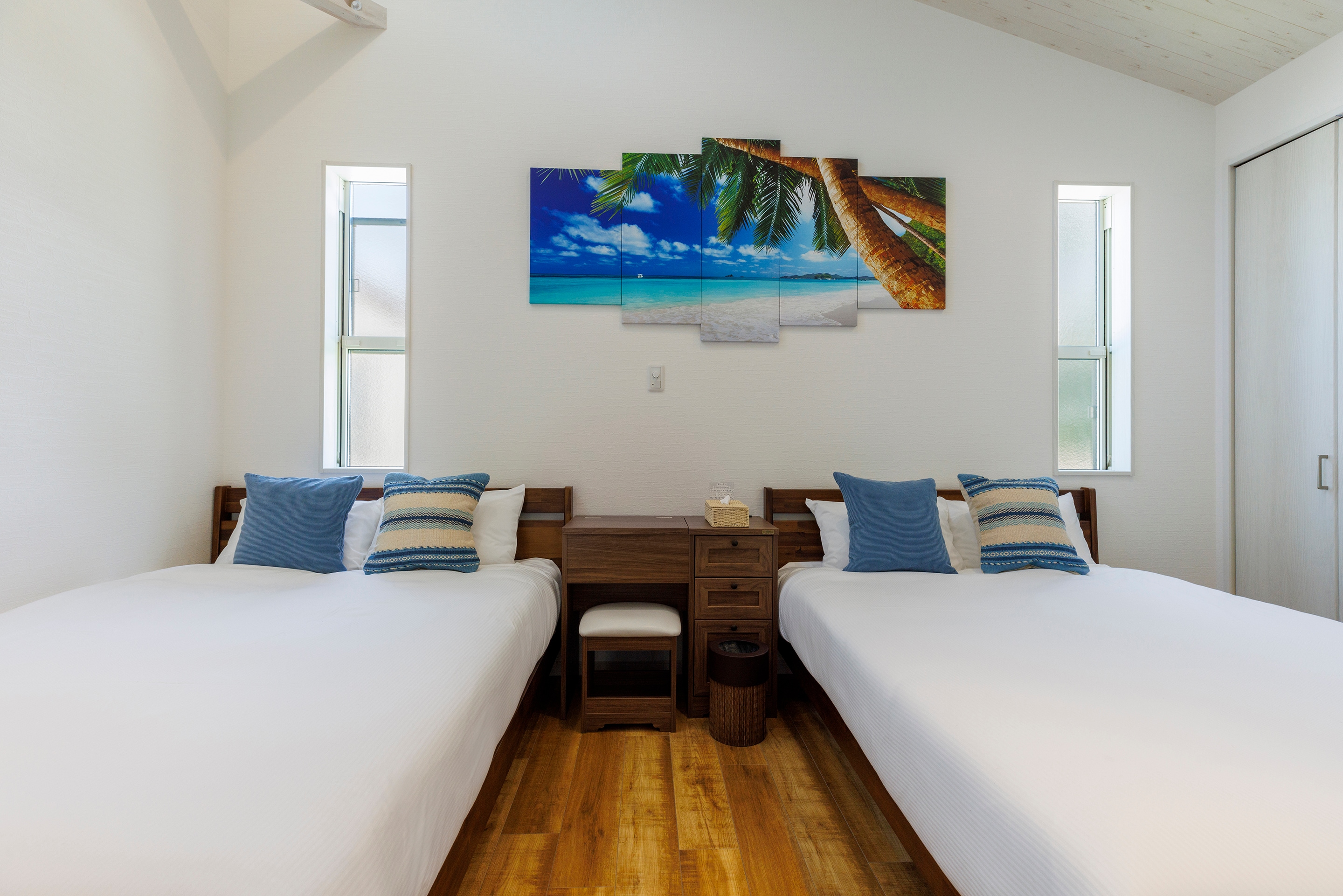 [La Ohana 2] The beds are spacious, perfect for relaxing after a long trip.