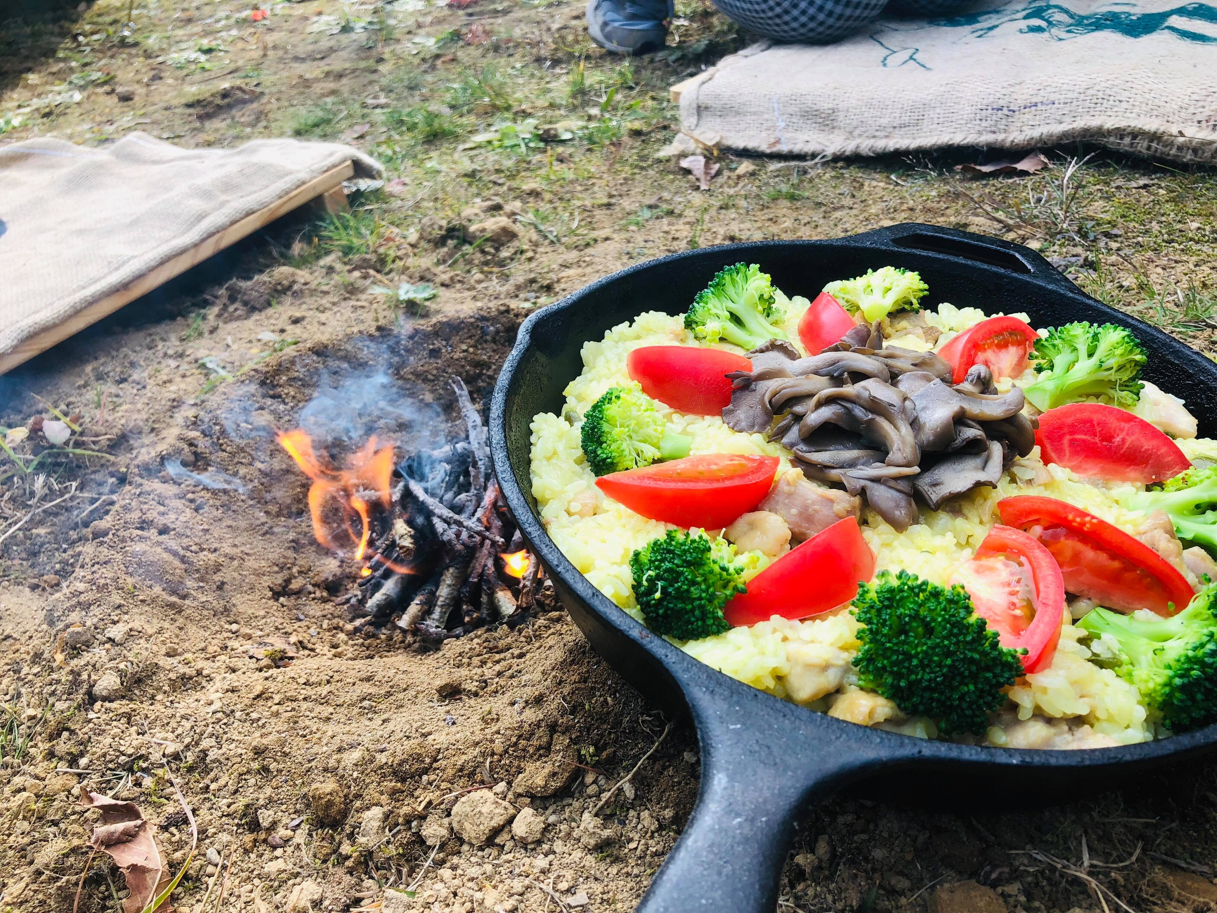 Bonfire cooking (local chicken and mushroom paella pan)