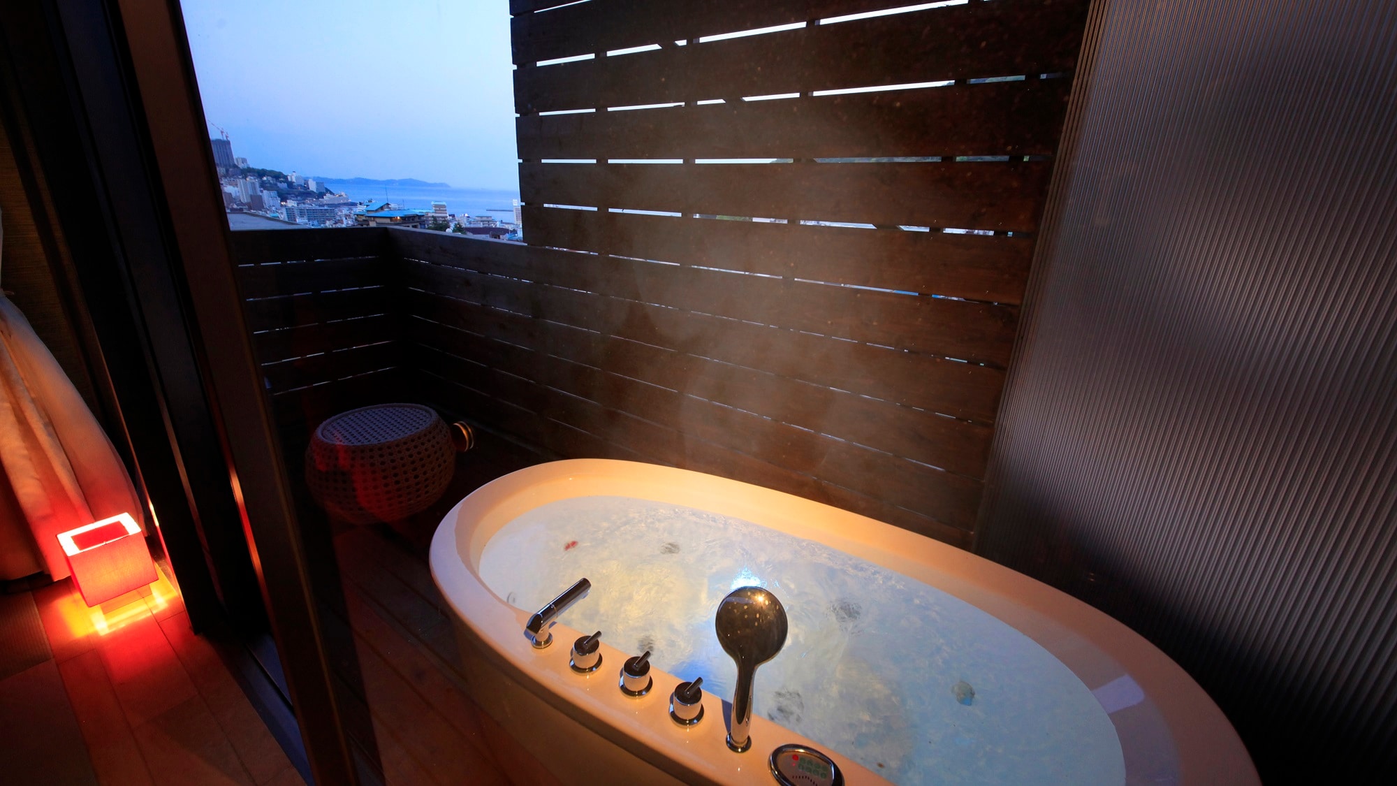 [Twin Japanese-style room with open-air bath on the top floor] (Example)