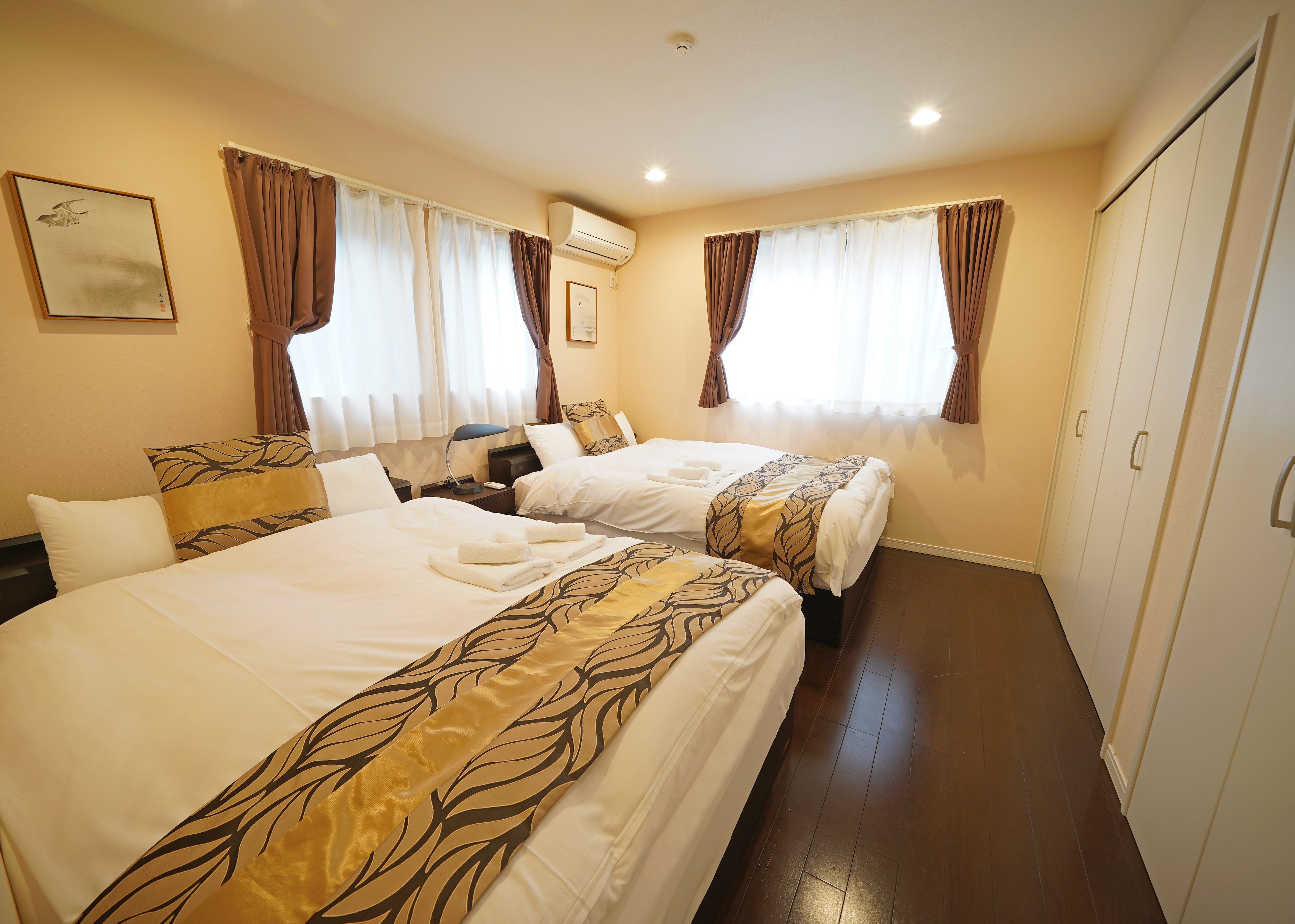 The private bedroom has two double beds, so you can have a good night's sleep.