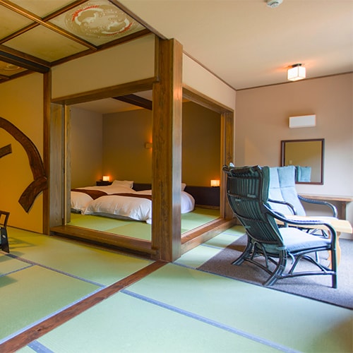 Japanese bedroom in a guest room with an open-air bath