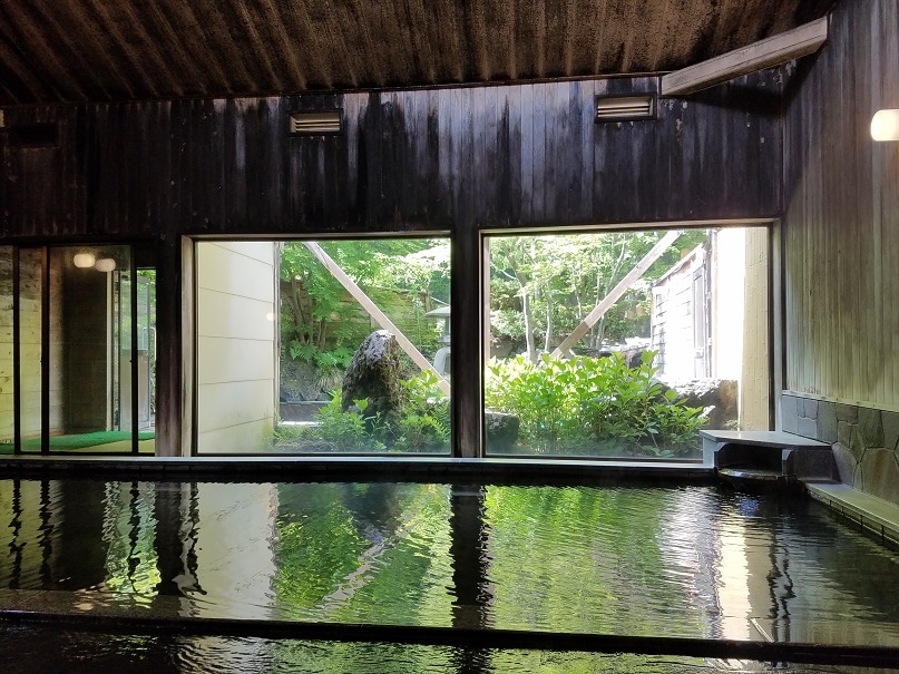 This is a picture of the open-air bath from the indoor bath.