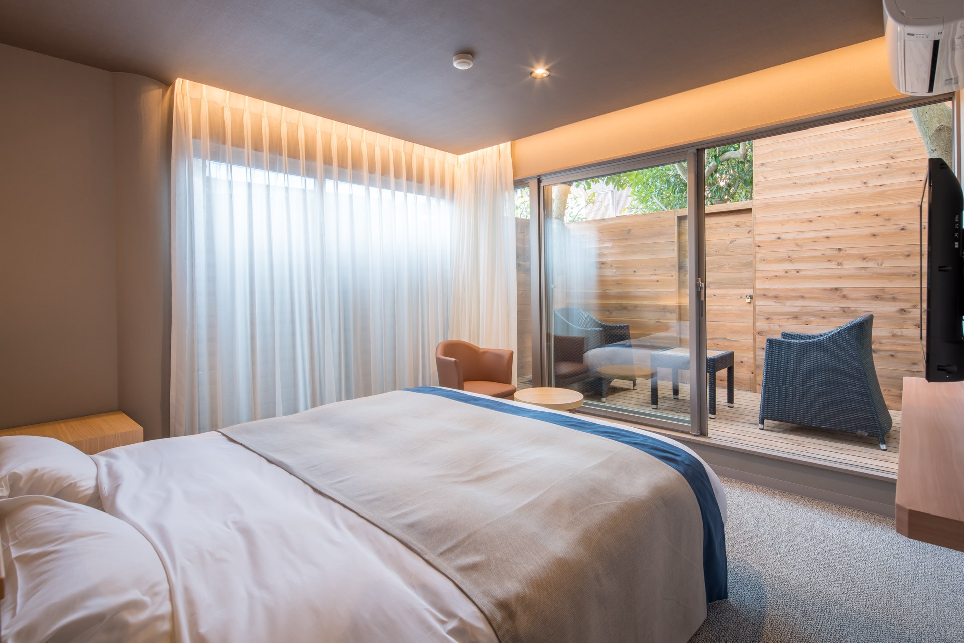 The "Terrace Suite King" is equipped with a king-size bed.