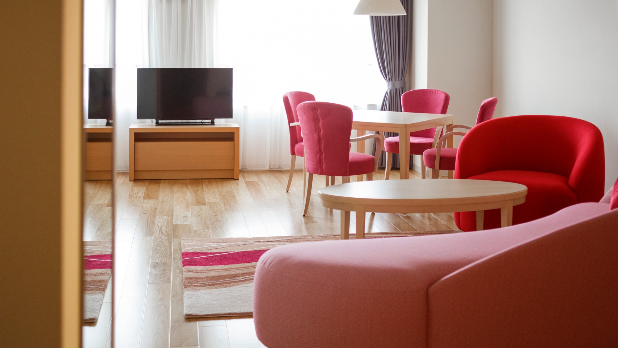 [Example of a standard triple room] A large sofa and dining table are provided for your relaxation.
