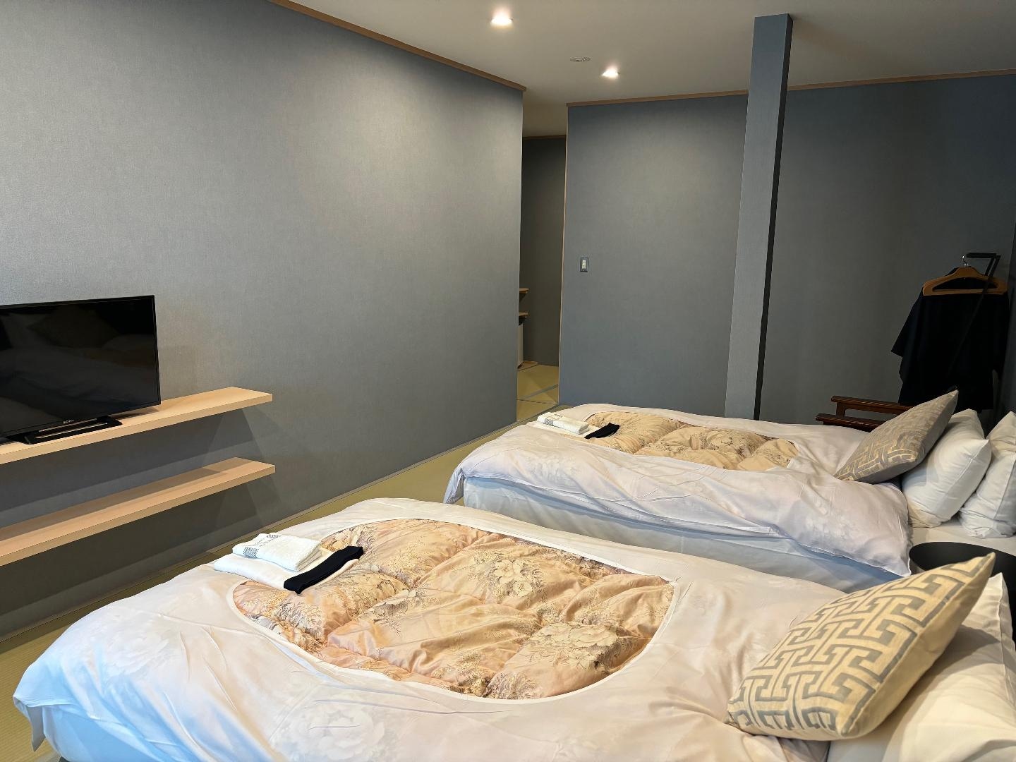 2 tempat tidur dengan sumber air panas malam berbintang