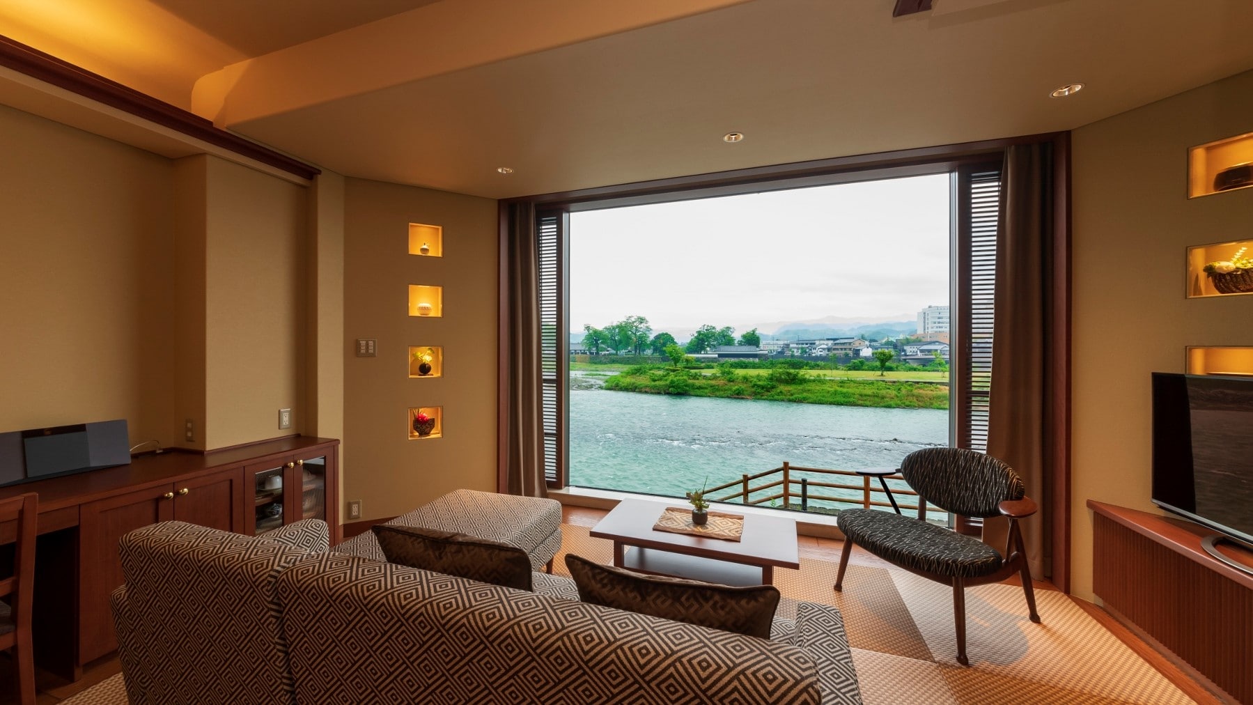 Japanese modern view premium room by the window overlooking the Kuma River