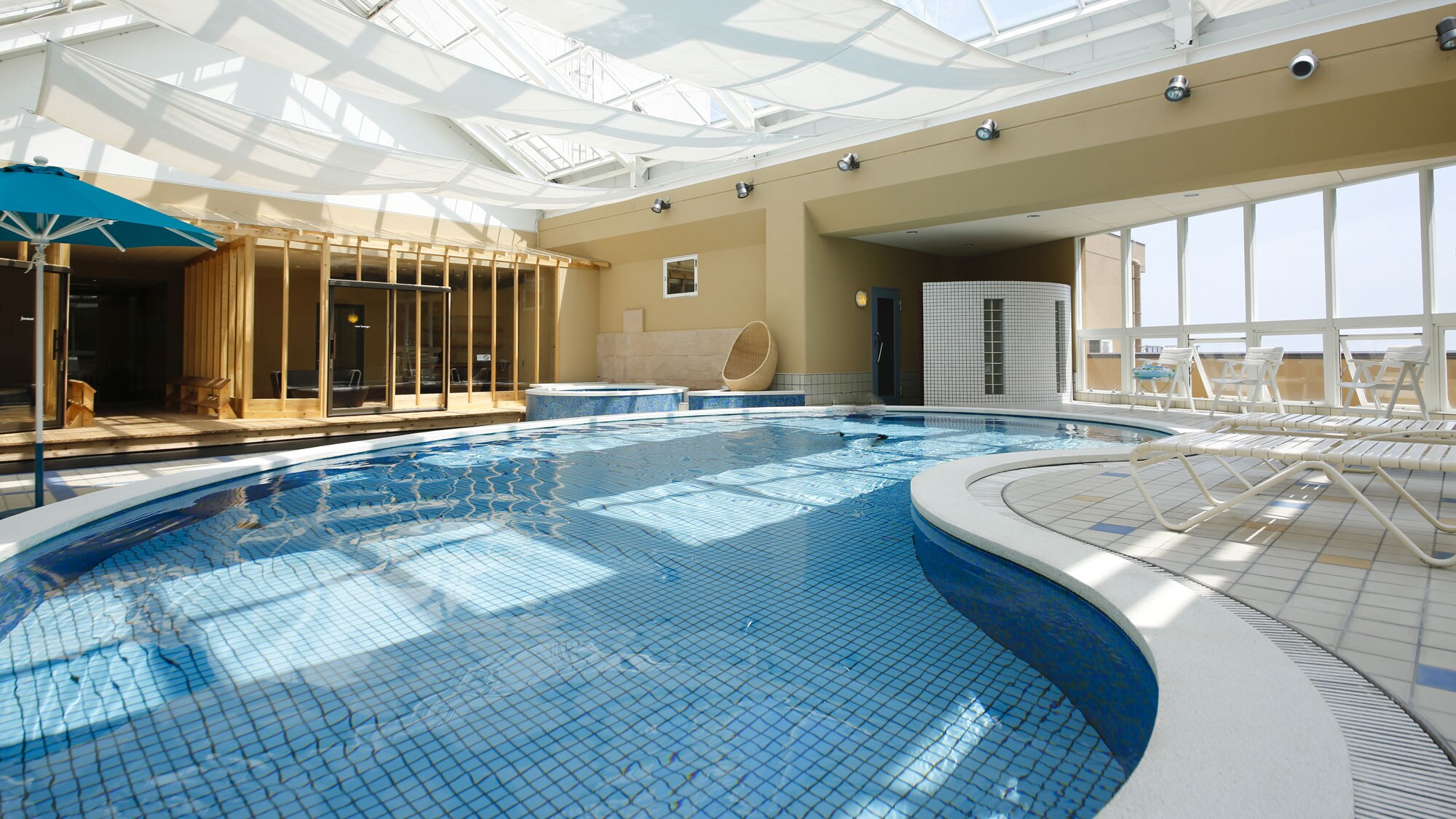 A heated indoor pool with a resort feel