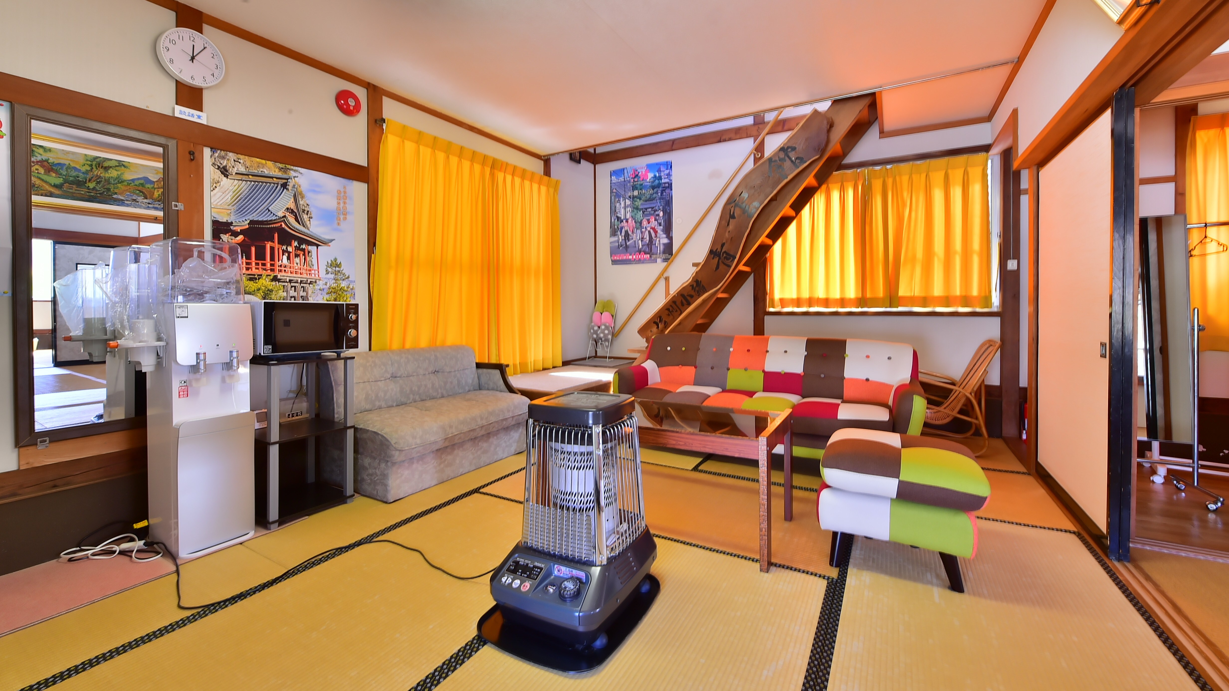 Shared facilities include a refrigerator, microwave, TV, and water dispenser.